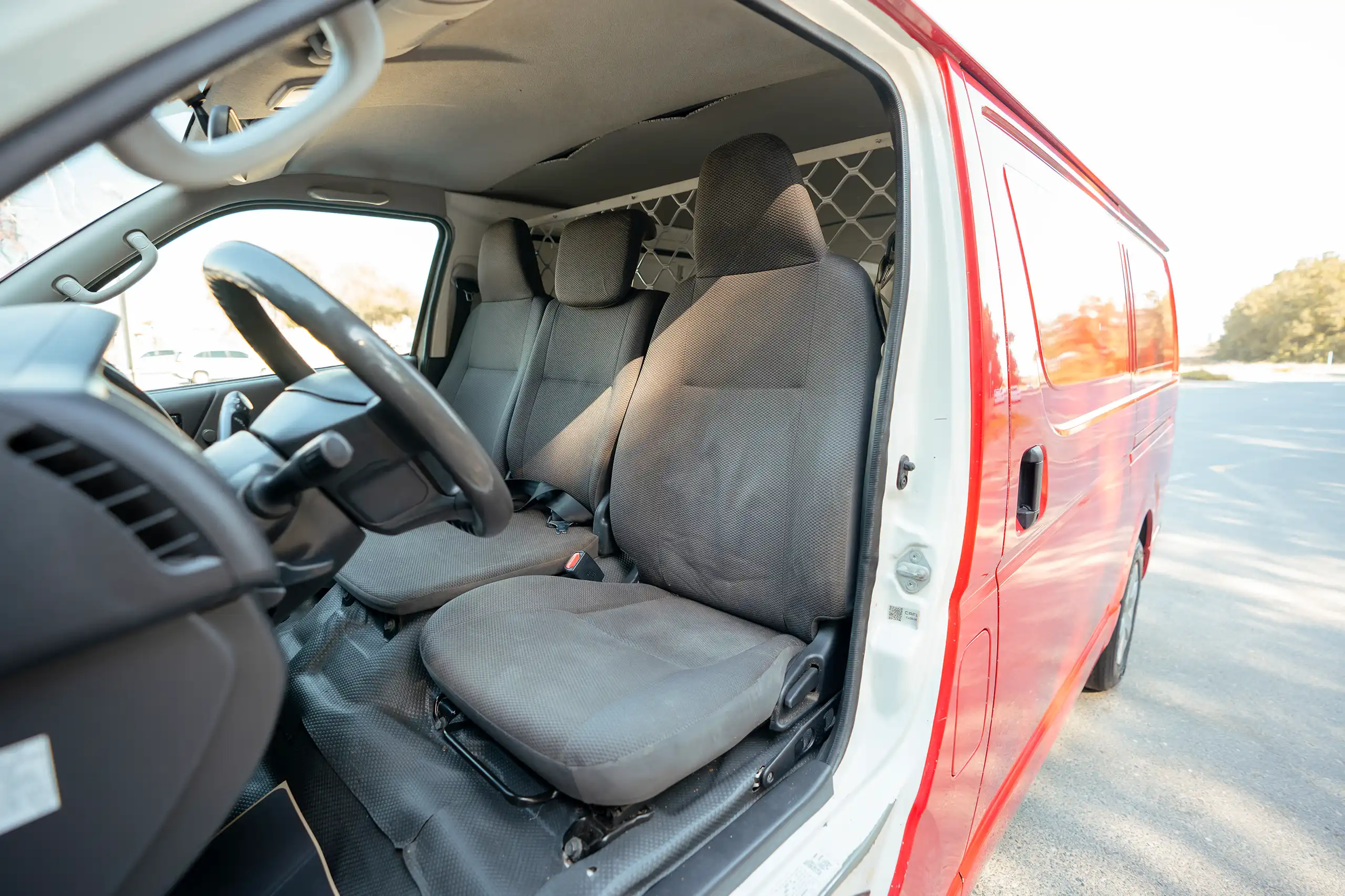 Used 2020 Toyota Hiace GL Standard Roof in Red – Front Driver Side Cabin View
