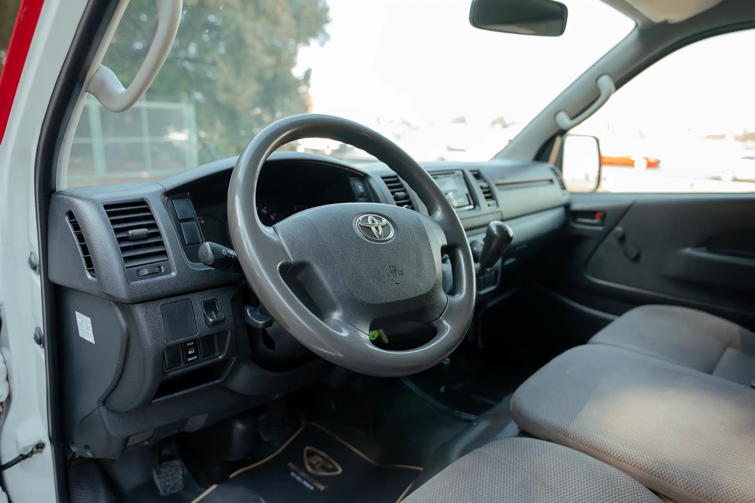 Used 2020 Toyota Hiace GL Standard Roof in Red – Driver Side Dashboard & Steering View