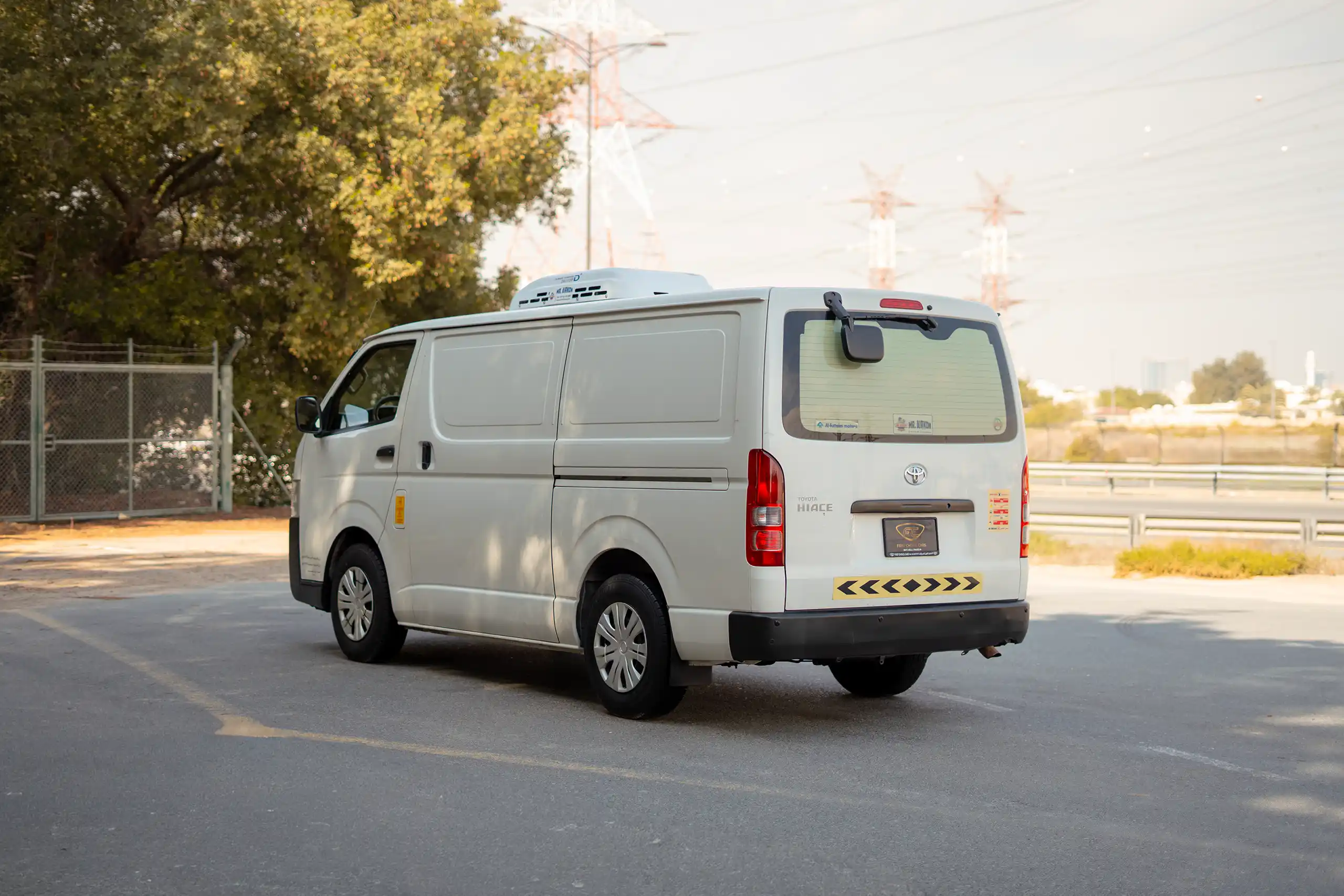Used 2023 Toyota Hiace GL Standard Roof White – Left Back Diagonal (45°) View at First Choice Cars Sharjah