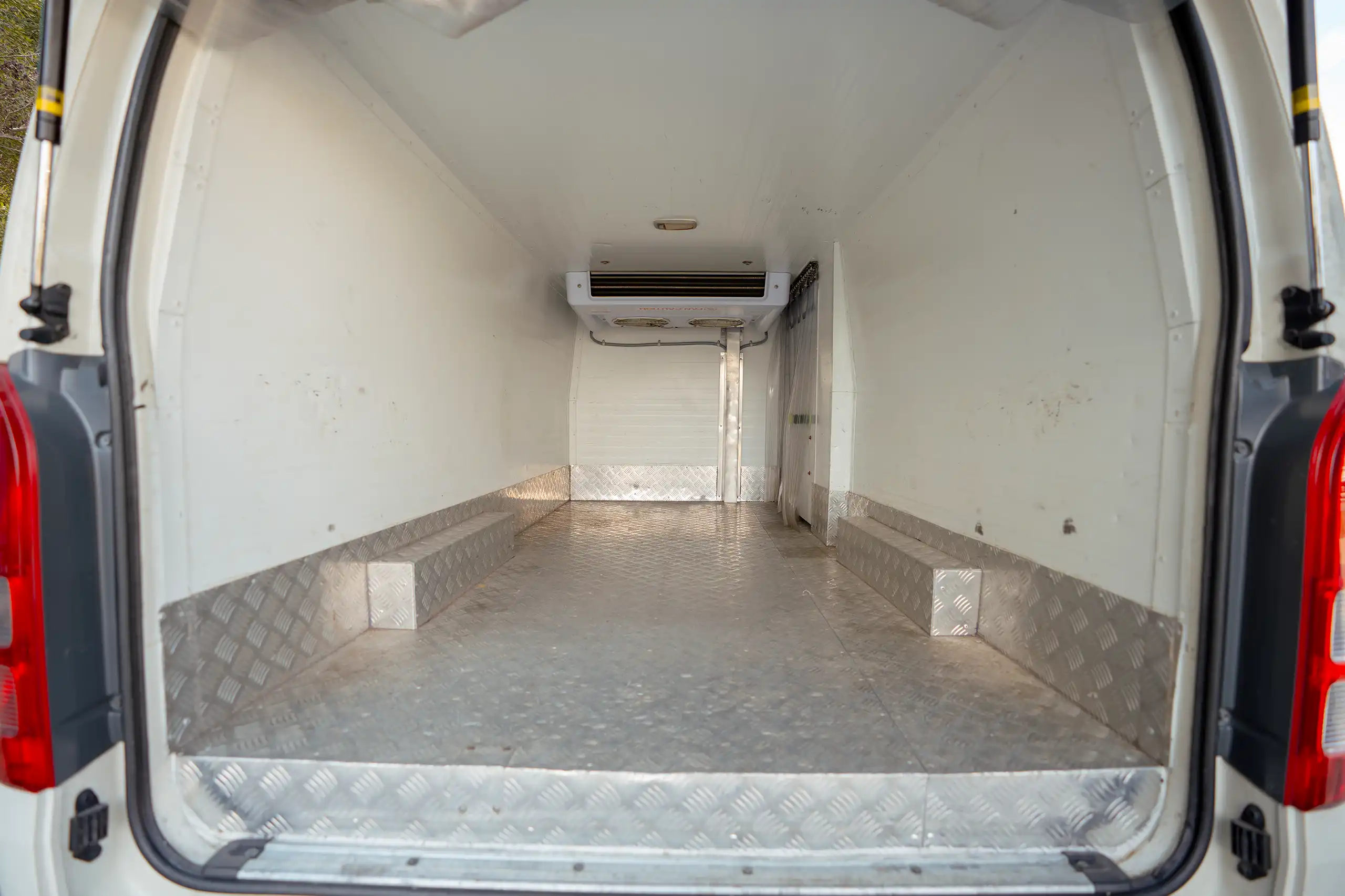 Used 2023 Toyota Hiace GL Standard Roof White – Freezer Box Rear-to-Front View at First Choice Cars Sharjah