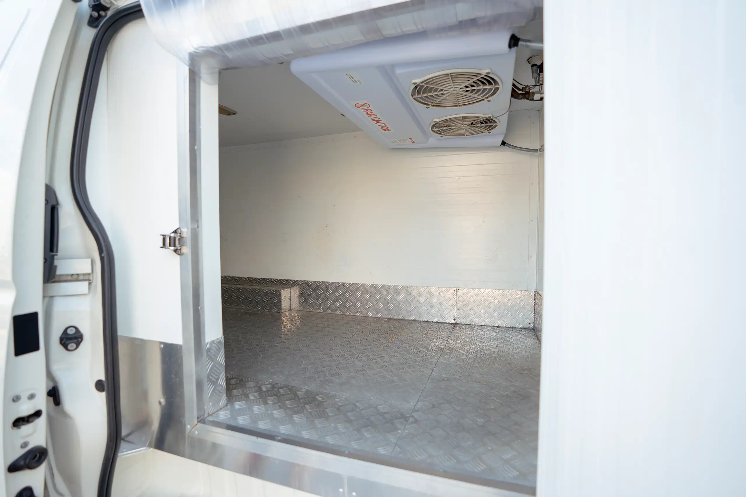 Used 2023 Toyota Hiace GL Standard Roof White – Freezer Box Right Side Interior View at First Choice Cars Sharjah