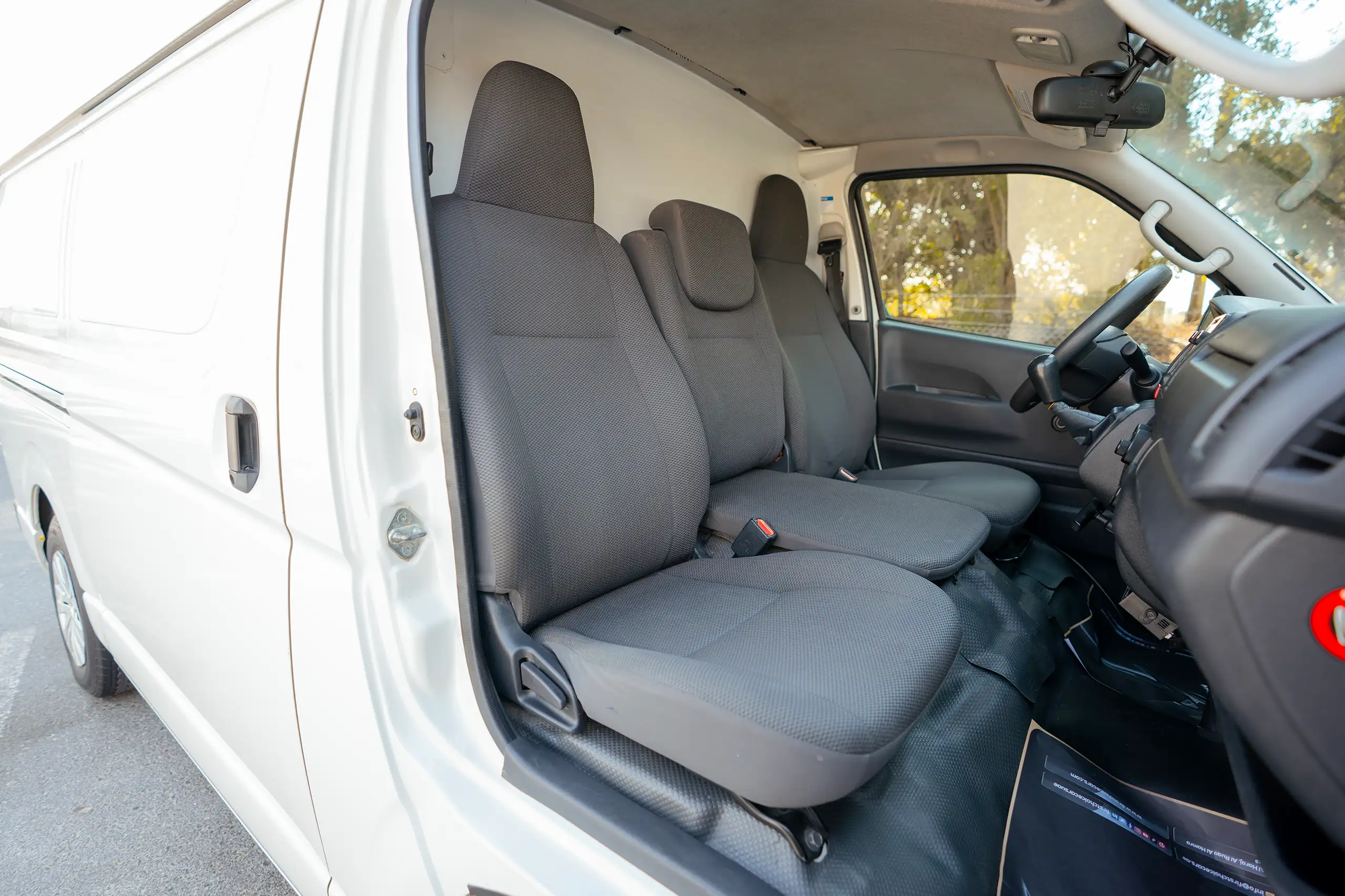 Used 2023 Toyota Hiace GL Standard Roof White – Front Passenger Side Cabin View at First Choice Cars Sharjah