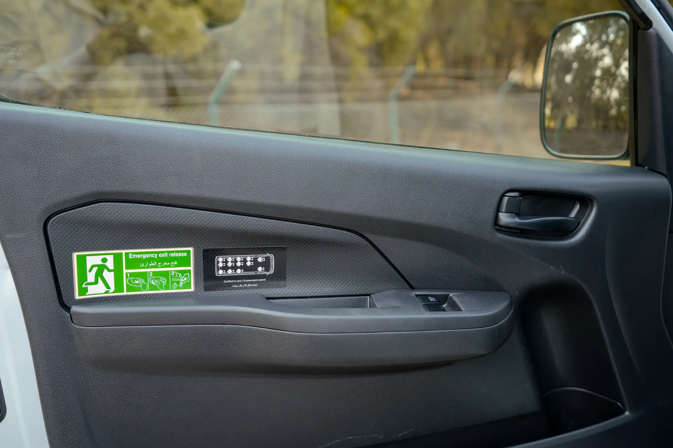 Used 2024 Nissan Urvan High Roof White – Driver Door Panel Full View at First Choice Cars Sharjah