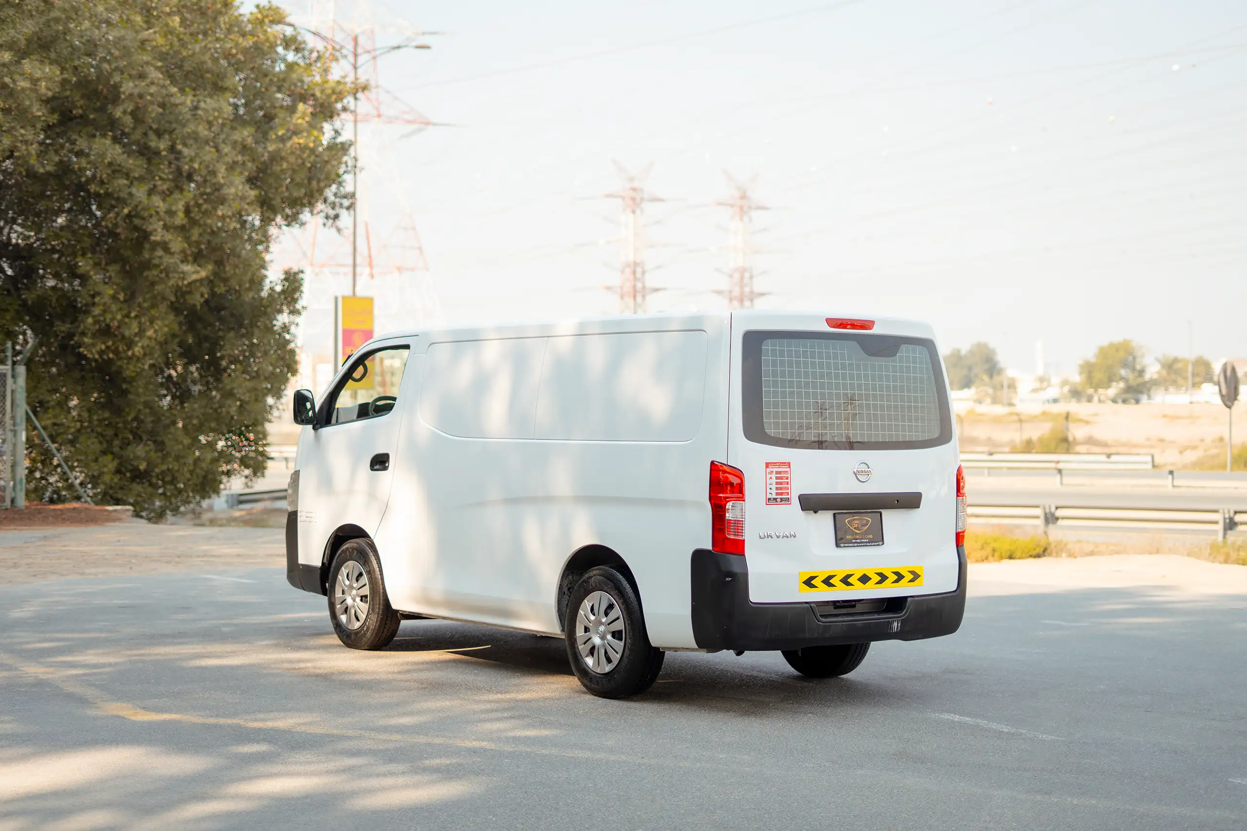Used 2022 Nissan Urvan Standard Roof White – Left Back Diagonal (45°) View at First Choice Cars Sharjah