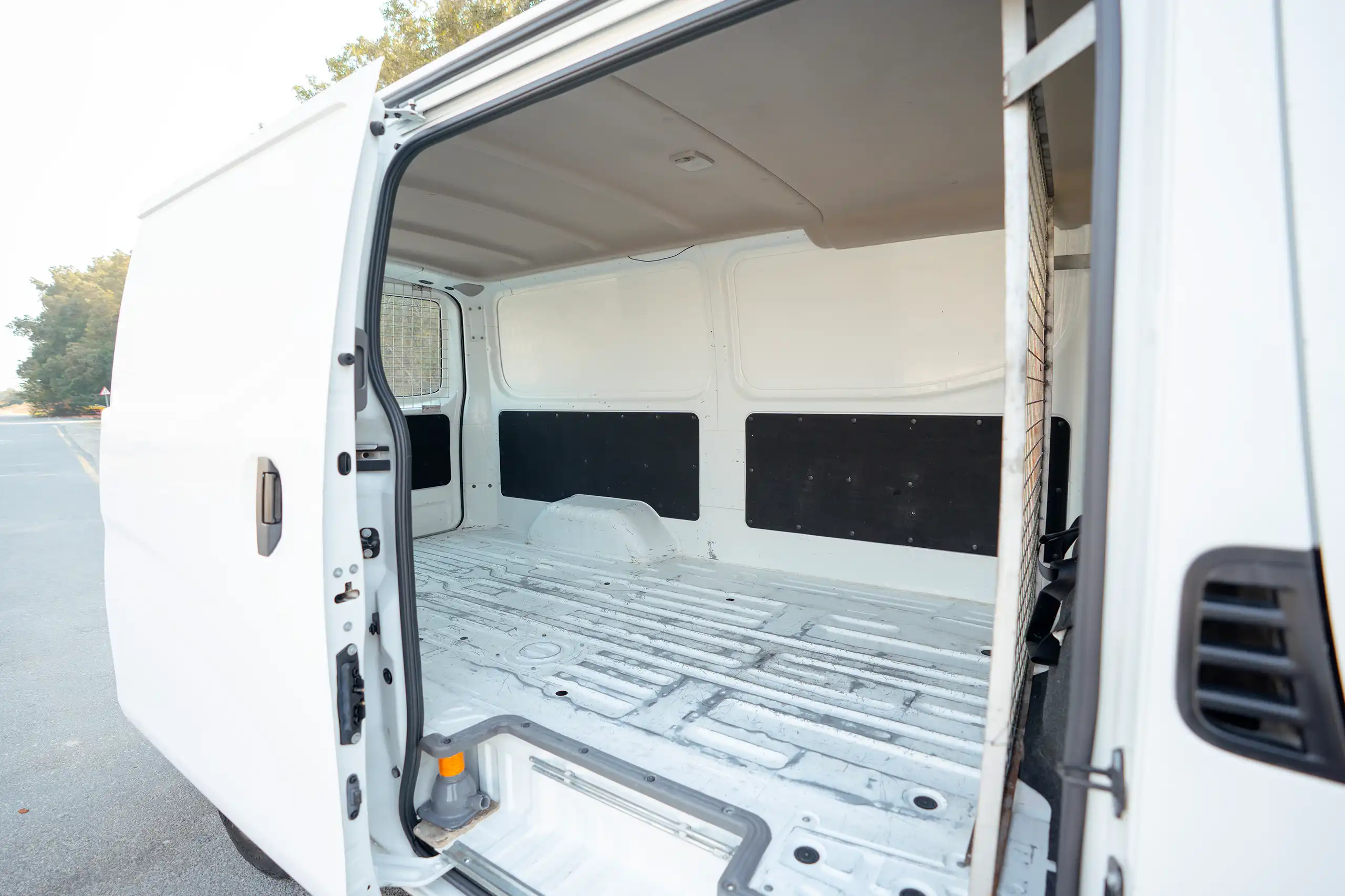 Used 2022 Nissan Urvan Standard Roof White – Delivery Box Right Side Interior View at First Choice Cars Sharjah