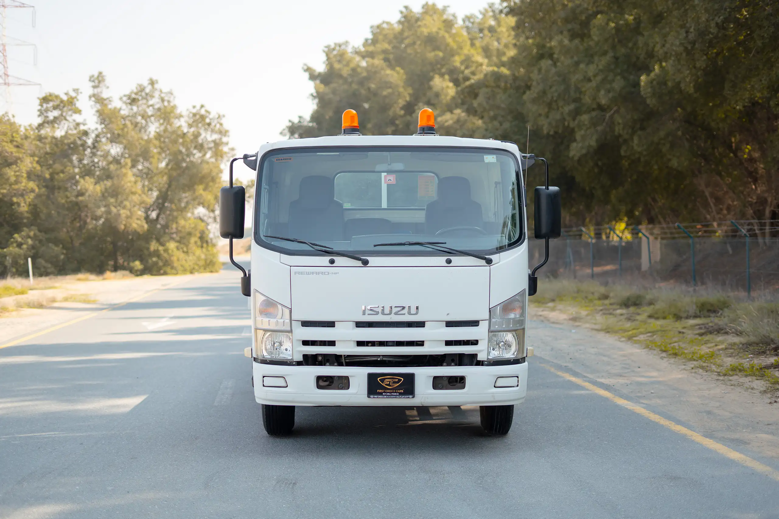 Used 2017 Isuzu NPR Recovery in White – Front View for Sale at First Choice Cars Dubai Sharjah