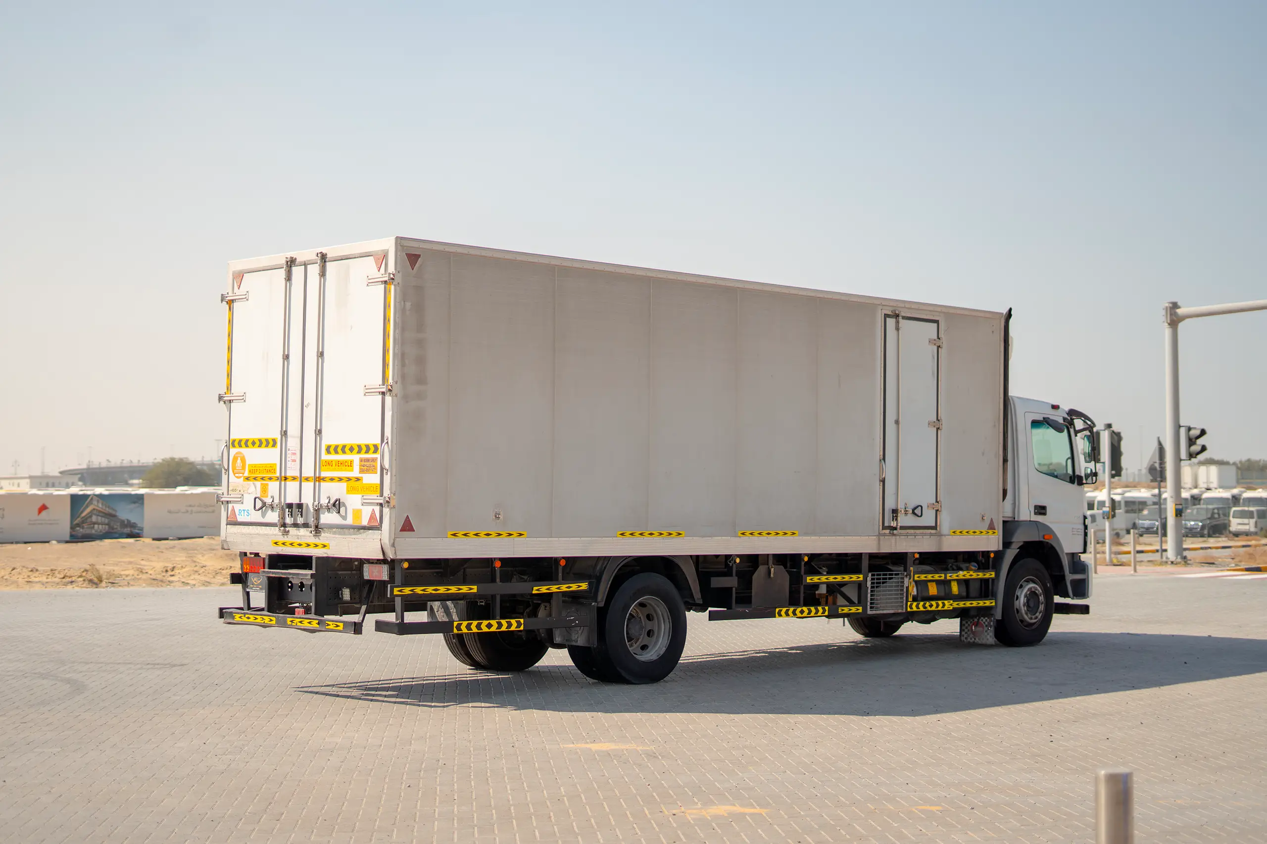 Used 2020 Mitsubishi FUSO FJ Freezer Box White – Right Back Diagonal (45°) View at First Choice Cars Sharjah