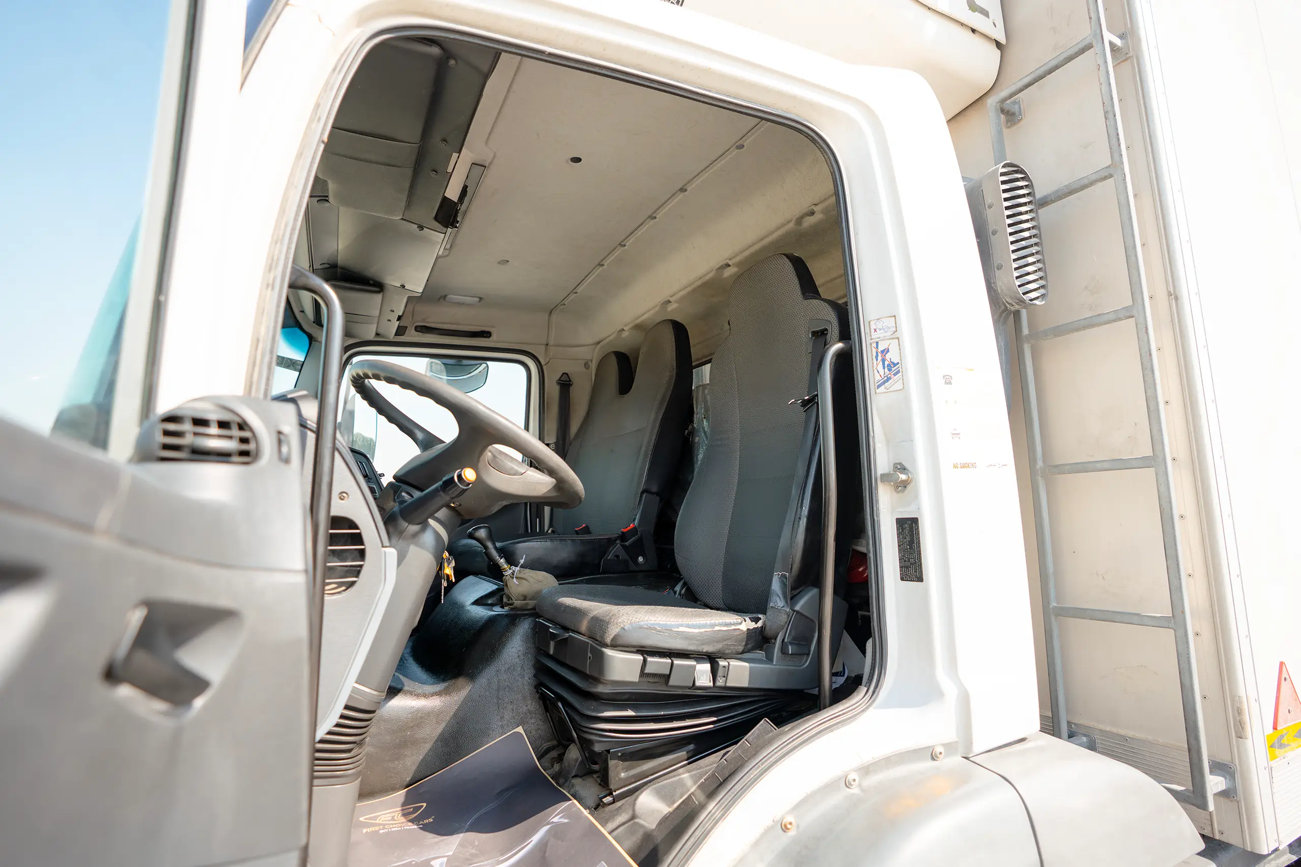 Used 2020 Mitsubishi FUSO FJ Freezer Box White – Front Driver Side Cabin View at First Choice Cars Sharjah