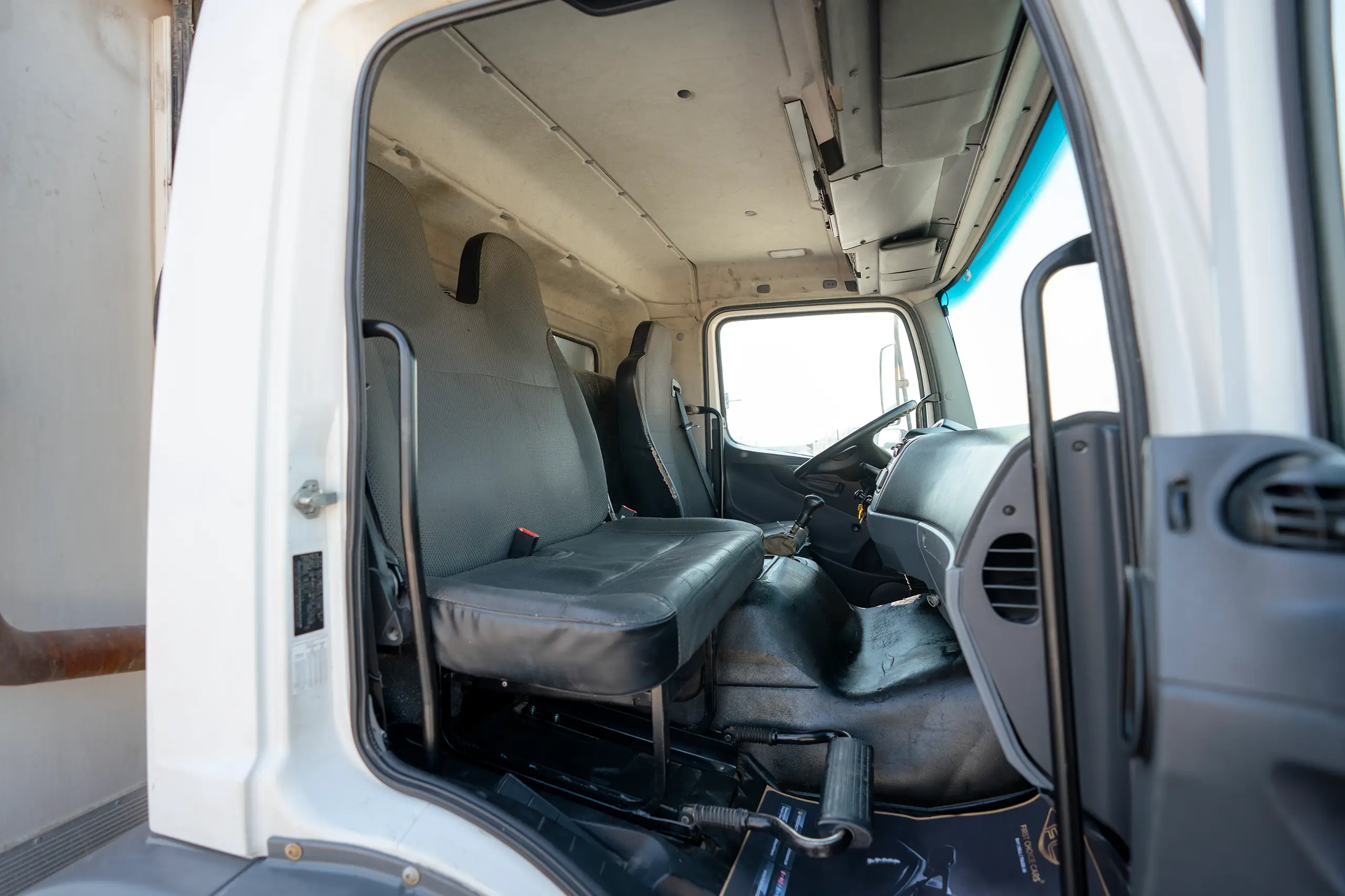 Used 2020 Mitsubishi FUSO FJ Freezer Box White – Front Passenger Side Cabin View at First Choice Cars Sharjah