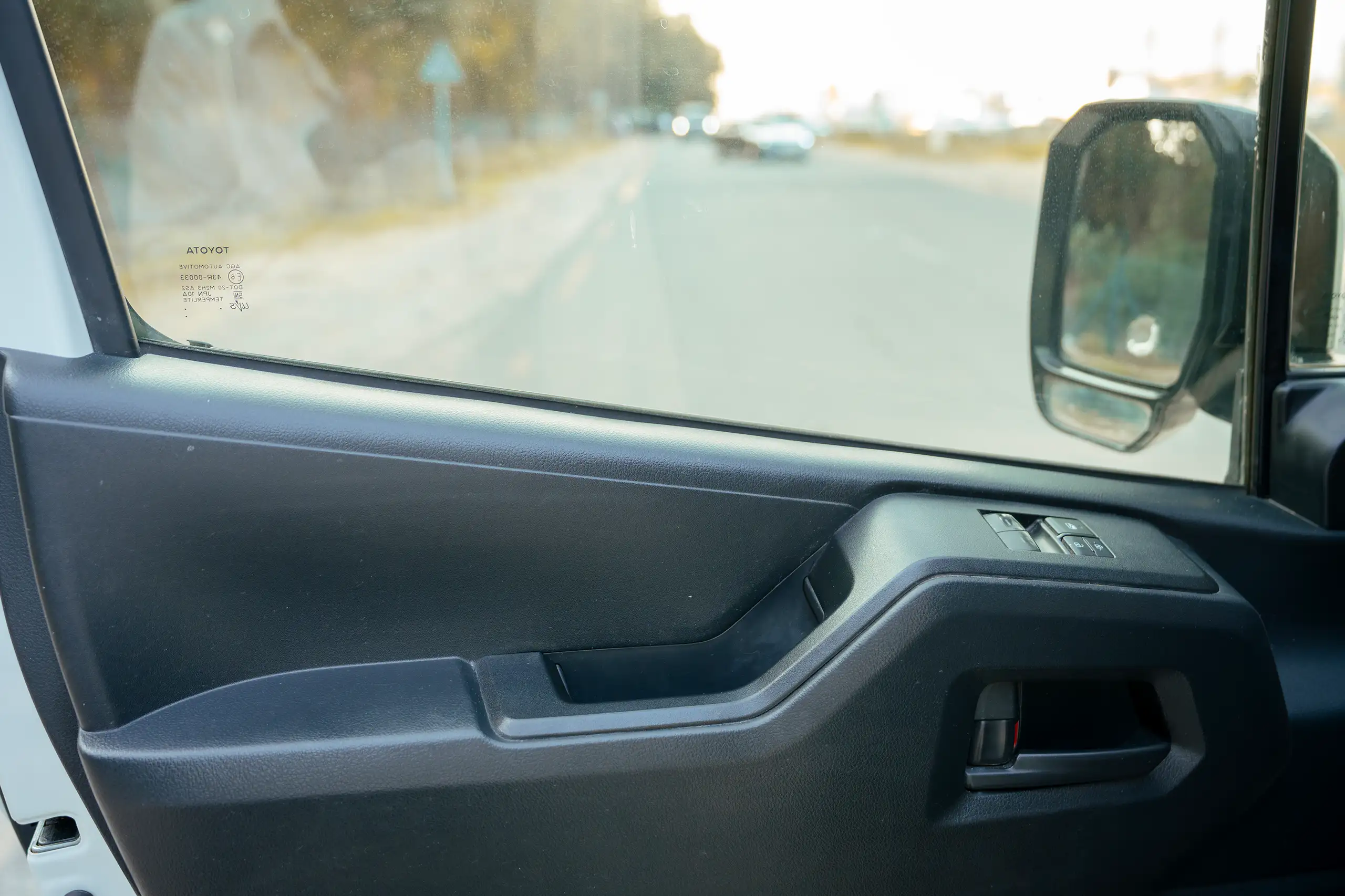 Used 2020 Toyota Hiace GL High Roof White – Driver Door Panel Full View at First Choice Cars Sharjah