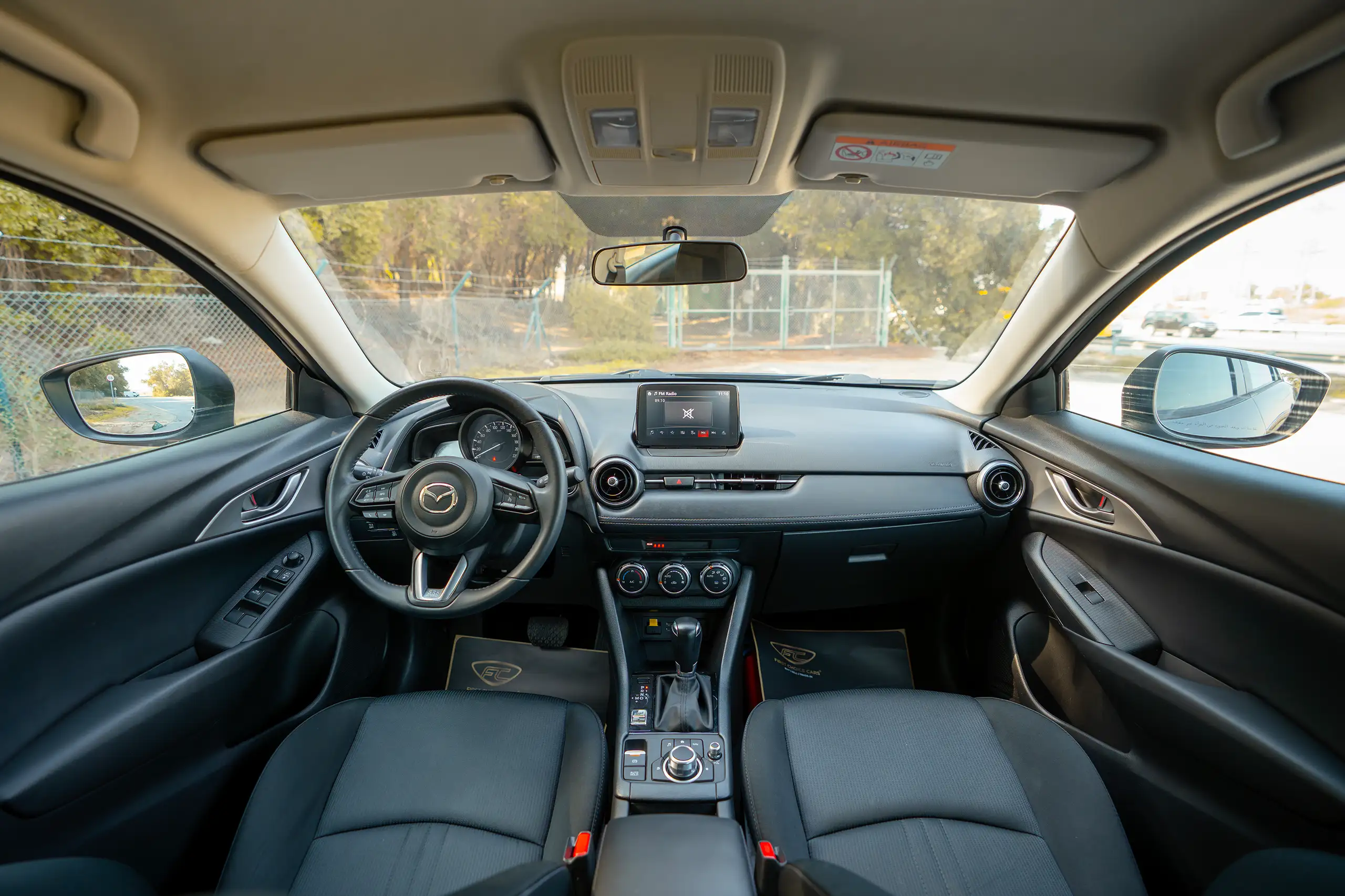 Used 2022 Mazda CX-3 GS Grey – Front Cabin / Dashboard Full View at First Choice Cars Sharjah