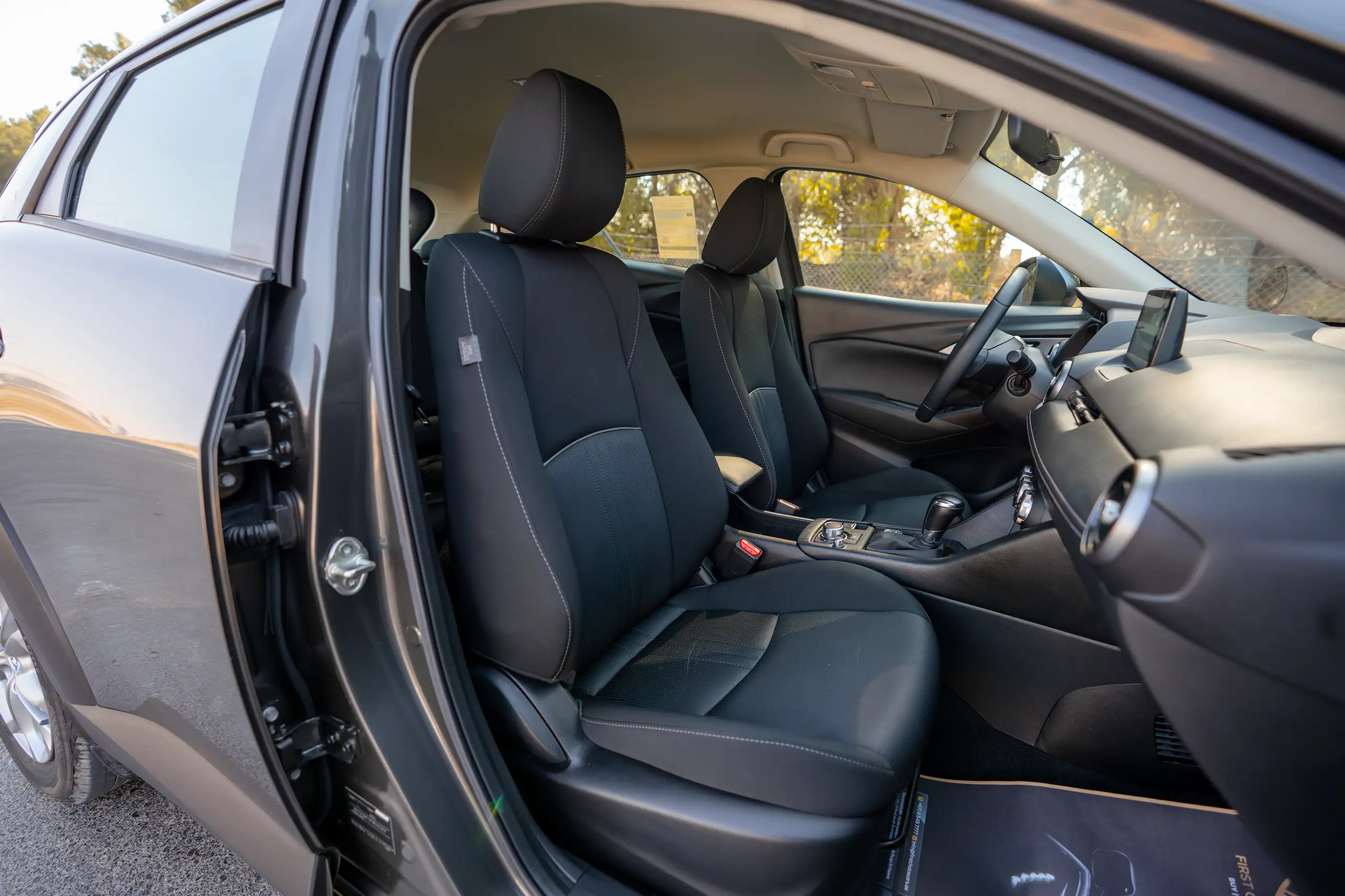 Used 2022 Mazda CX-3 GS Grey – Front Passenger Side Cabin View at First Choice Cars Sharjah