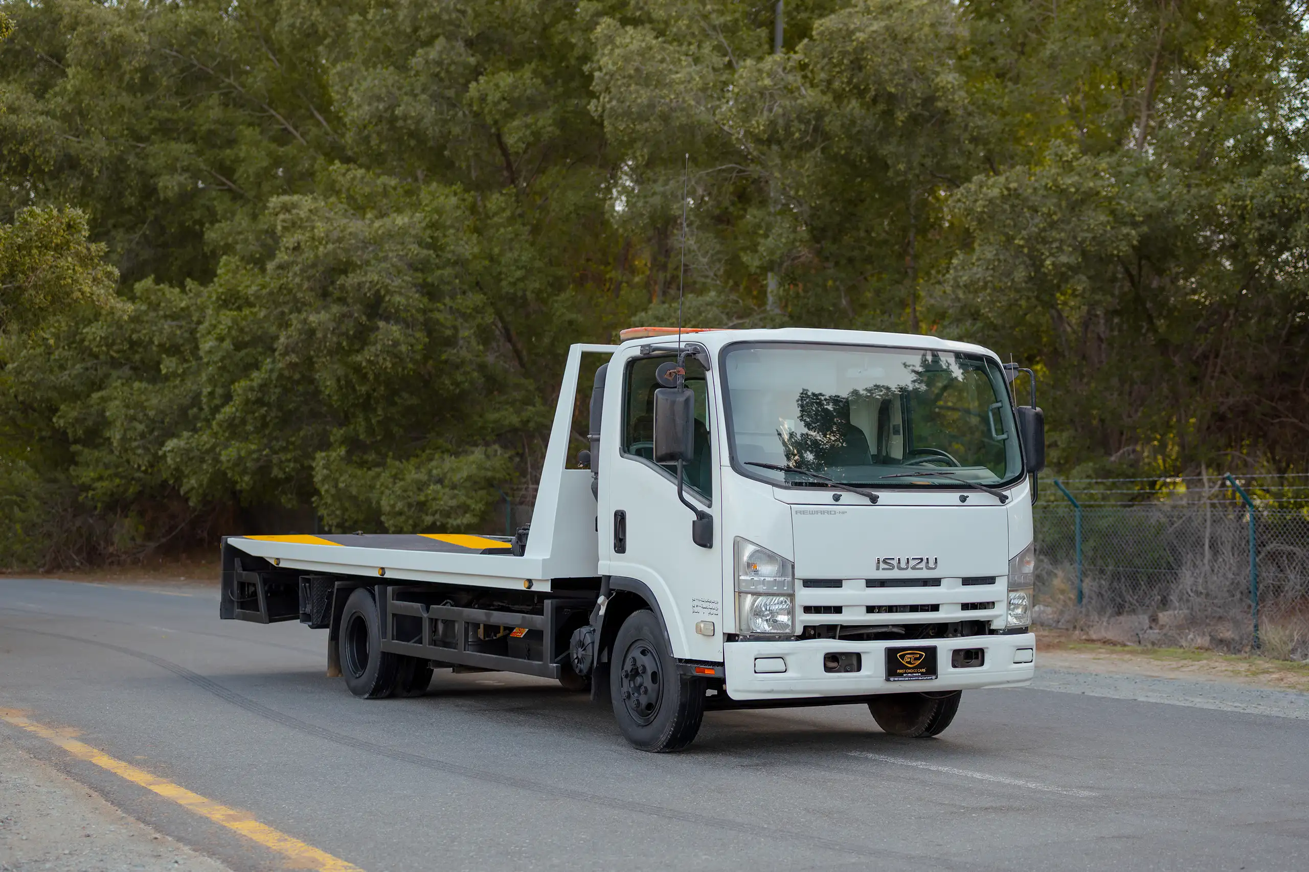 Used 2017 Isuzu NPR Recovery White – Right Front Diagonal (45°) View at First Choice Cars Sharjah