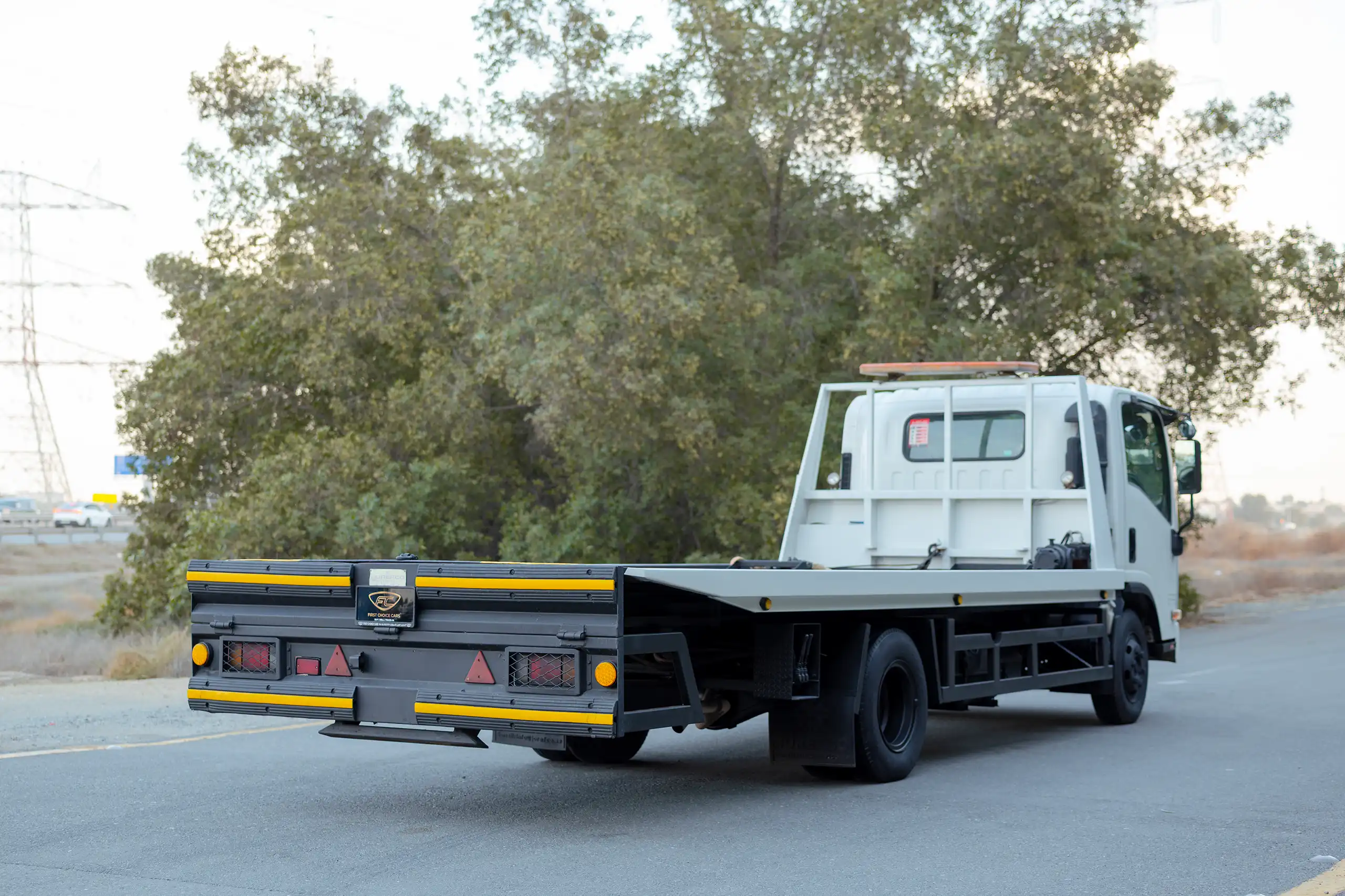 Used 2017 Isuzu NPR Recovery White – Right Back Diagonal (45°) View at First Choice Cars Sharjah
