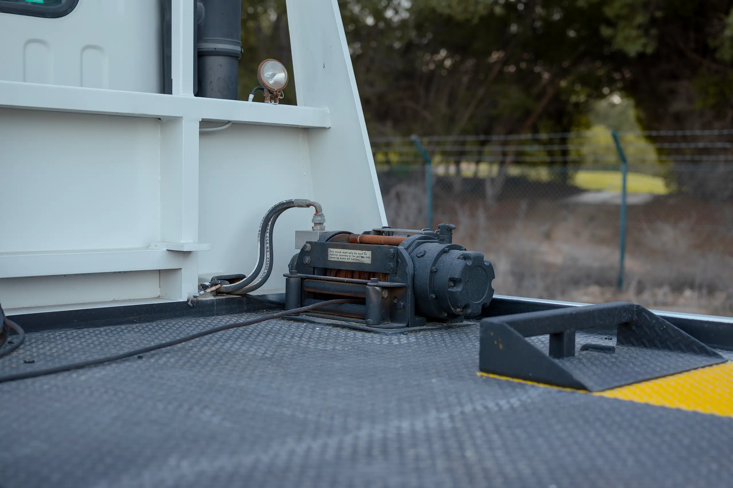 Used 2017 Isuzu NPR Recovery White – Recovery Rear Flatbed Equipment Close-Up at First Choice Cars Sharjah