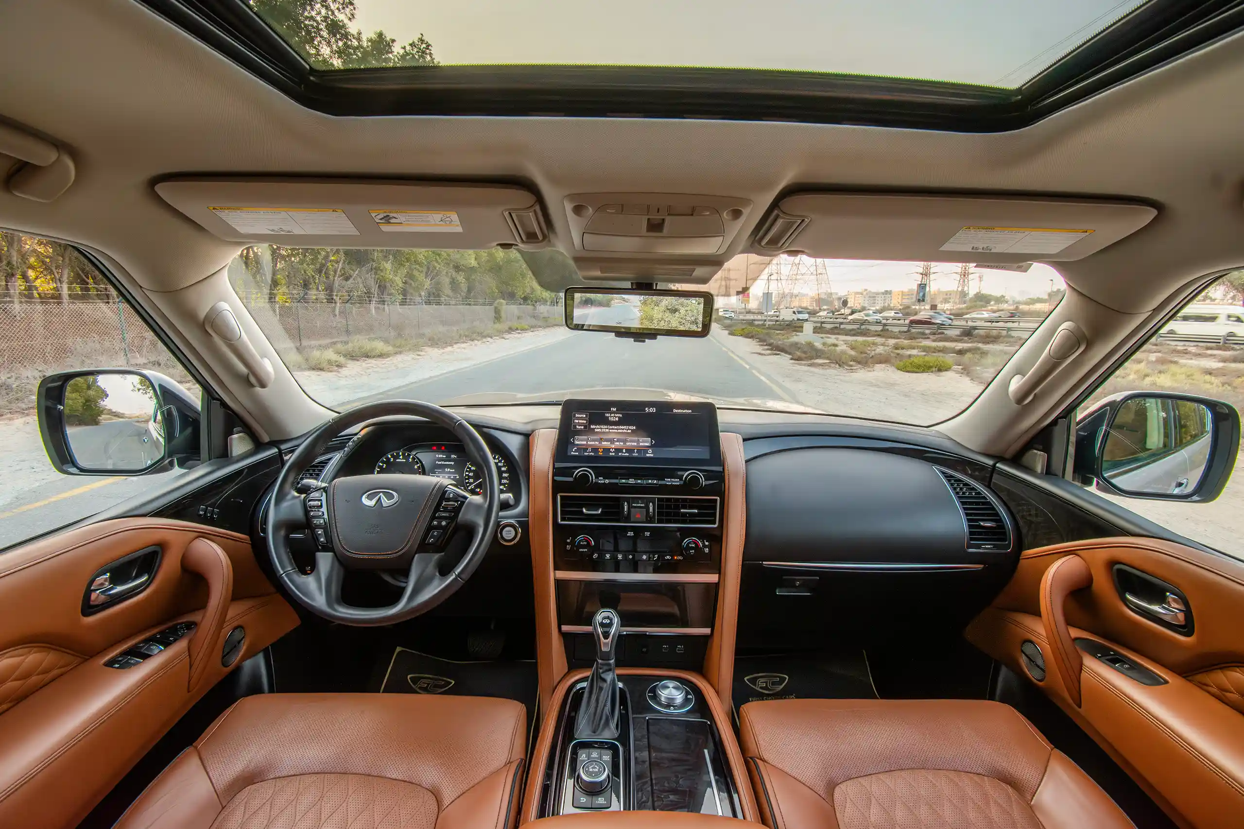 Used 2023 Infiniti QX80 Luxury Gold – Front Cabin / Dashboard Full View at First Choice Cars Sharjah