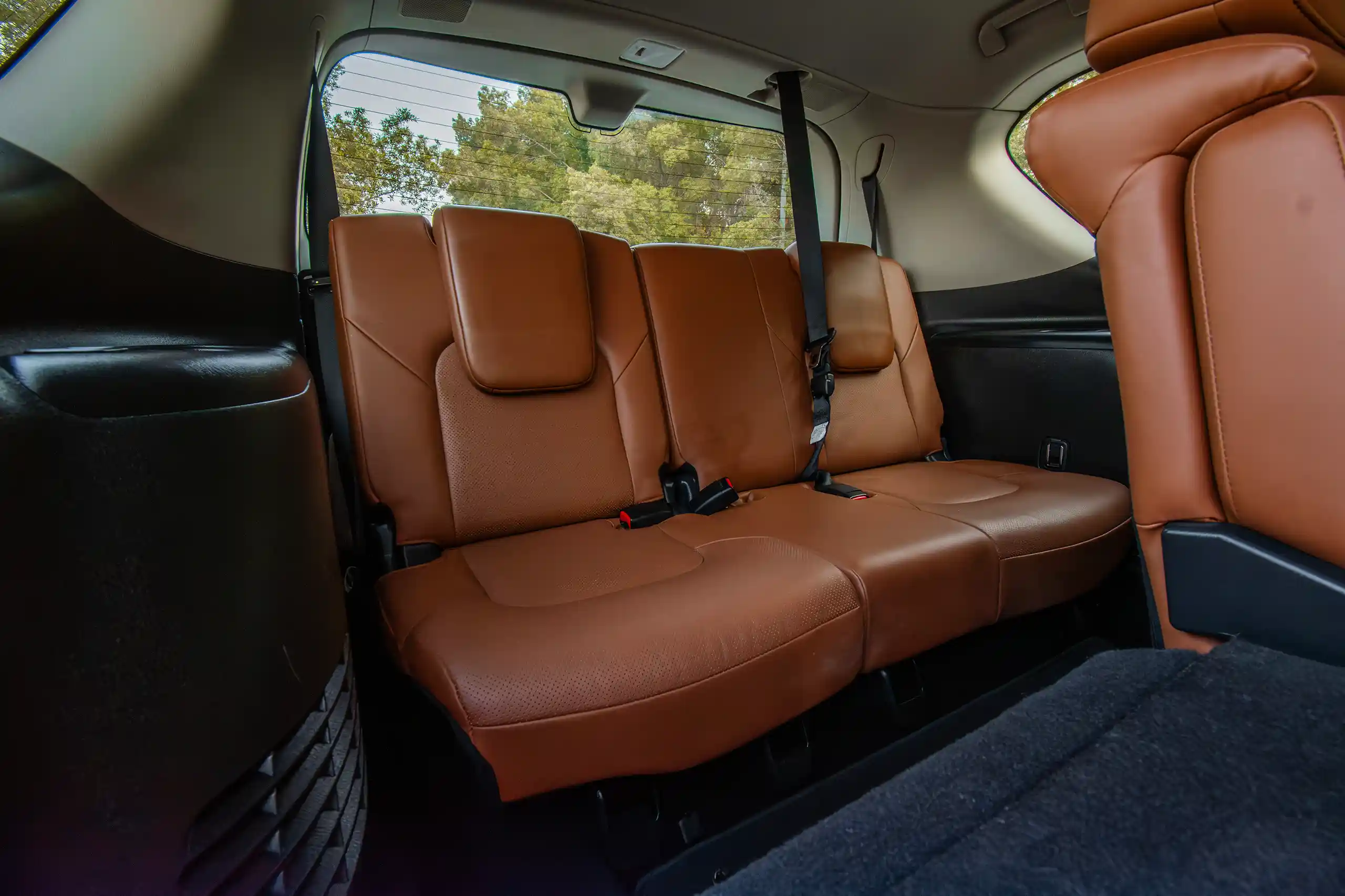 Used 2023 Infiniti QX80 Luxury Gold – Third Row Right Seat View at First Choice Cars Sharjah