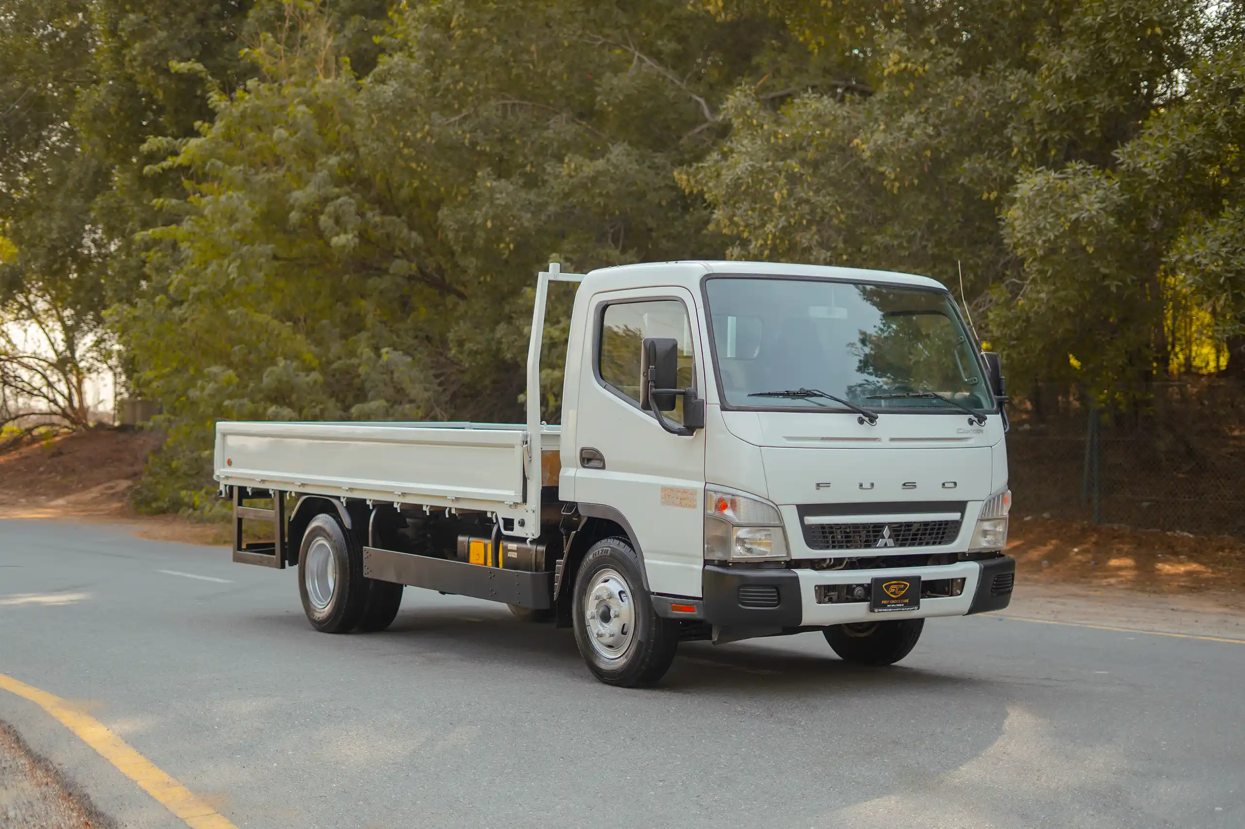 Used 2017 Mitsubishi Canter Cargo Body White – Right Front Diagonal (45°) View at First Choice Cars Sharjah