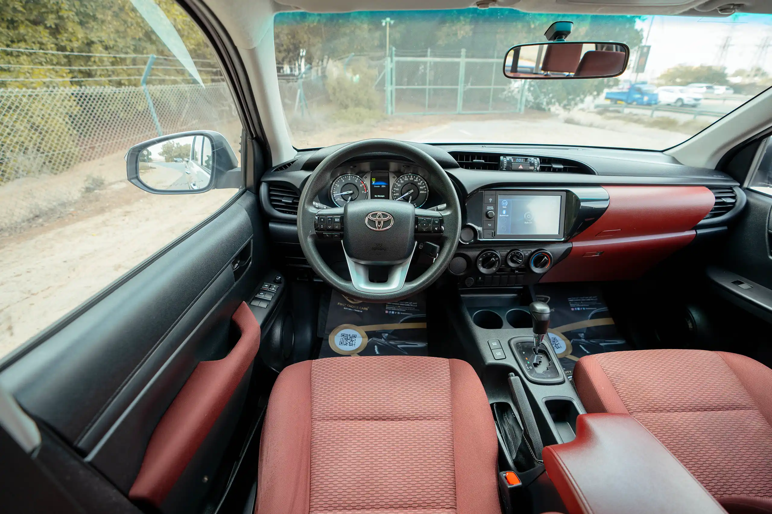 Used 2022 Toyota Hilux GLX Double Cabin White – Steering Wheel & Instrument Cluster at First Choice Cars Sharjah