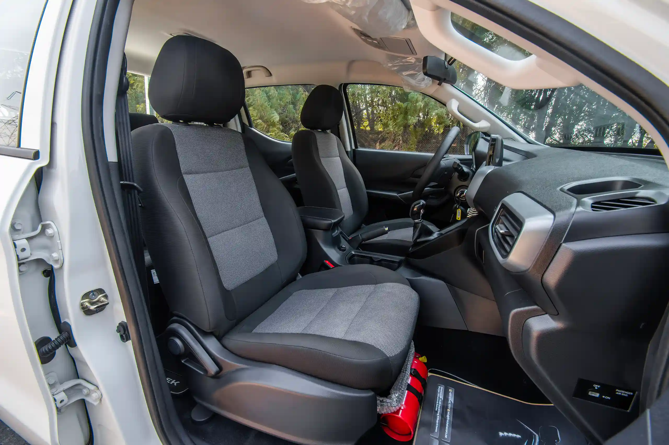 Used 2023 Peugeot Landtrek Double Cabin White – Front Passenger Side Cabin View at First Choice Cars Sharjah