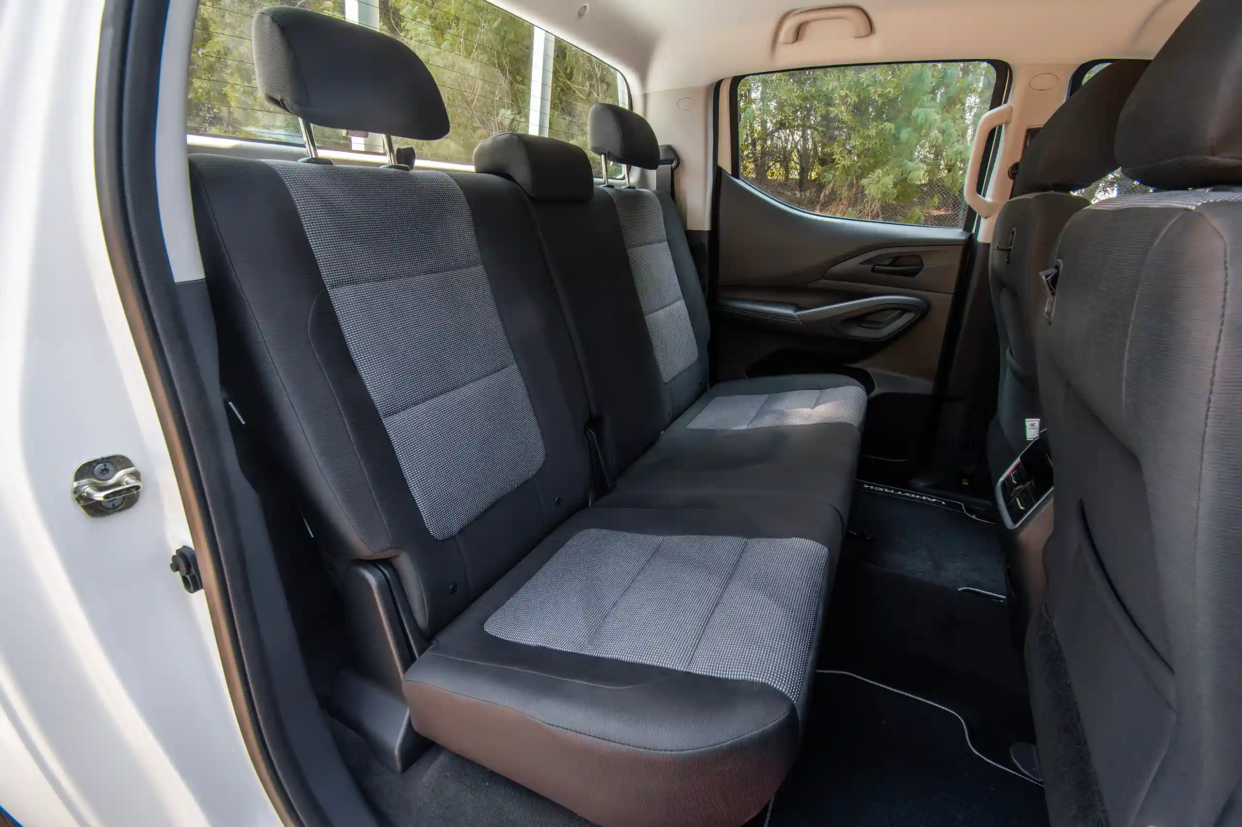 Used 2023 Peugeot Landtrek Double Cabin White – Rear Passenger Side Cabin View at First Choice Cars Sharjah