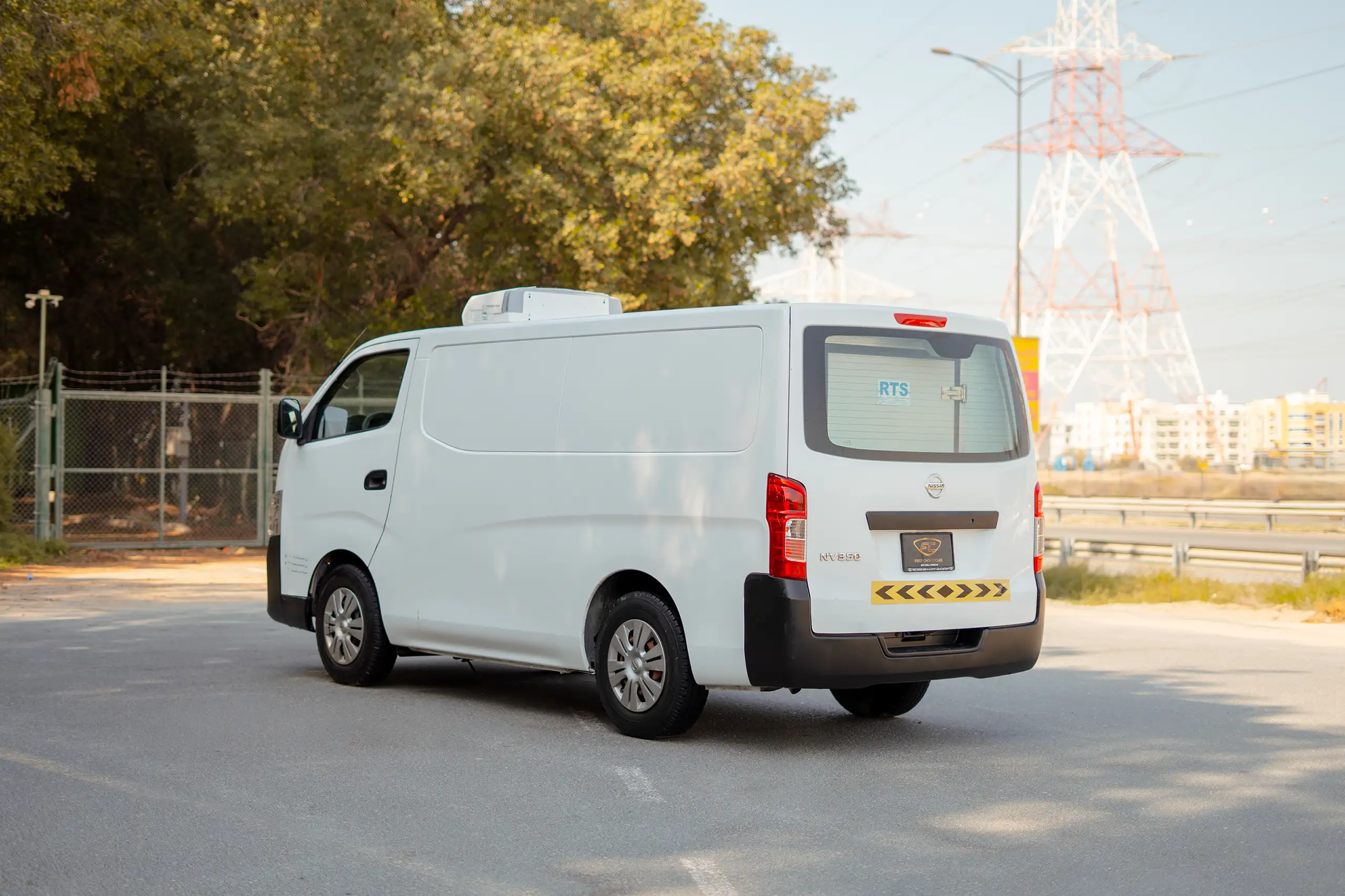 Used 2020 Nissan Urvan Standard Roof in White – Left Back Diagonal (45°) View for Sale at First Choice Cars Dubai Sharjah
