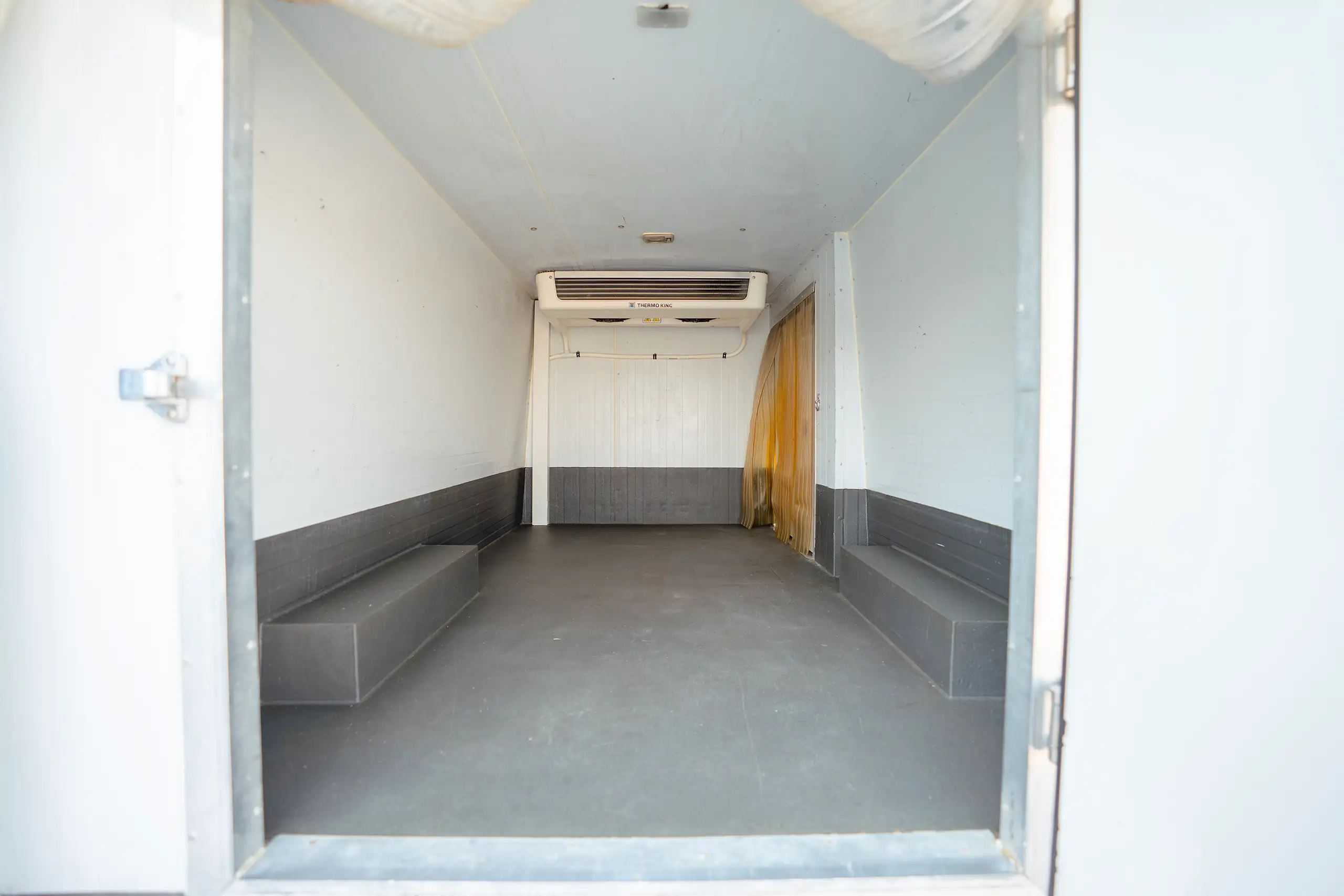Used 2020 Nissan Urvan Standard Roof in White – Freezer Box Rear Opening View for Sale at First Choice Cars Dubai Sharjah
