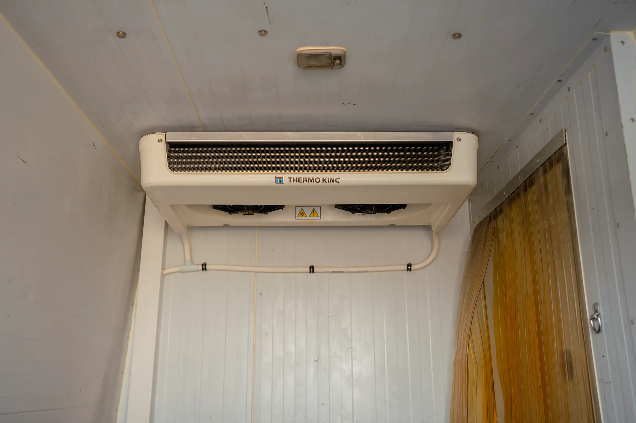 Used 2020 Nissan Urvan Standard Roof in White – Freezer Cooling Unit View for Sale at First Choice Cars Dubai Sharjah