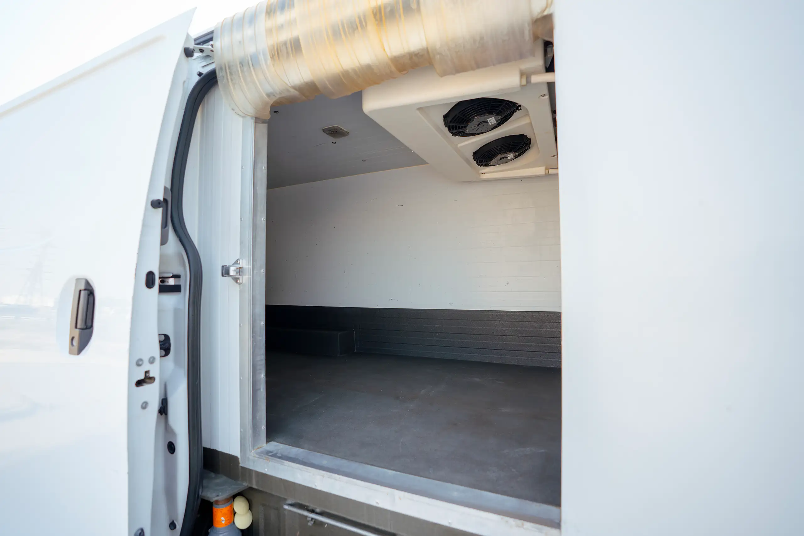 Used 2020 Nissan Urvan Standard Roof in White – Freezer Box Right Side Interior View for Sale at First Choice Cars Dubai Sharjah