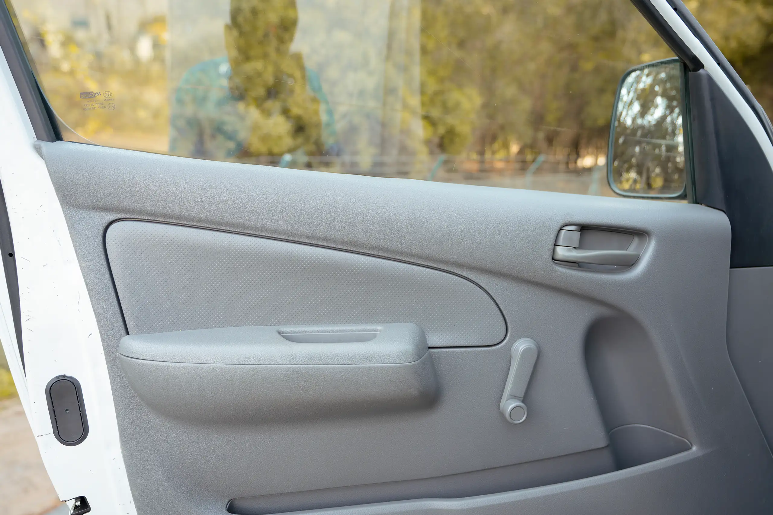 Used 2020 Nissan Urvan Standard Roof in White – Driver Door Panel Full View for Sale at First Choice Cars Dubai Sharjah