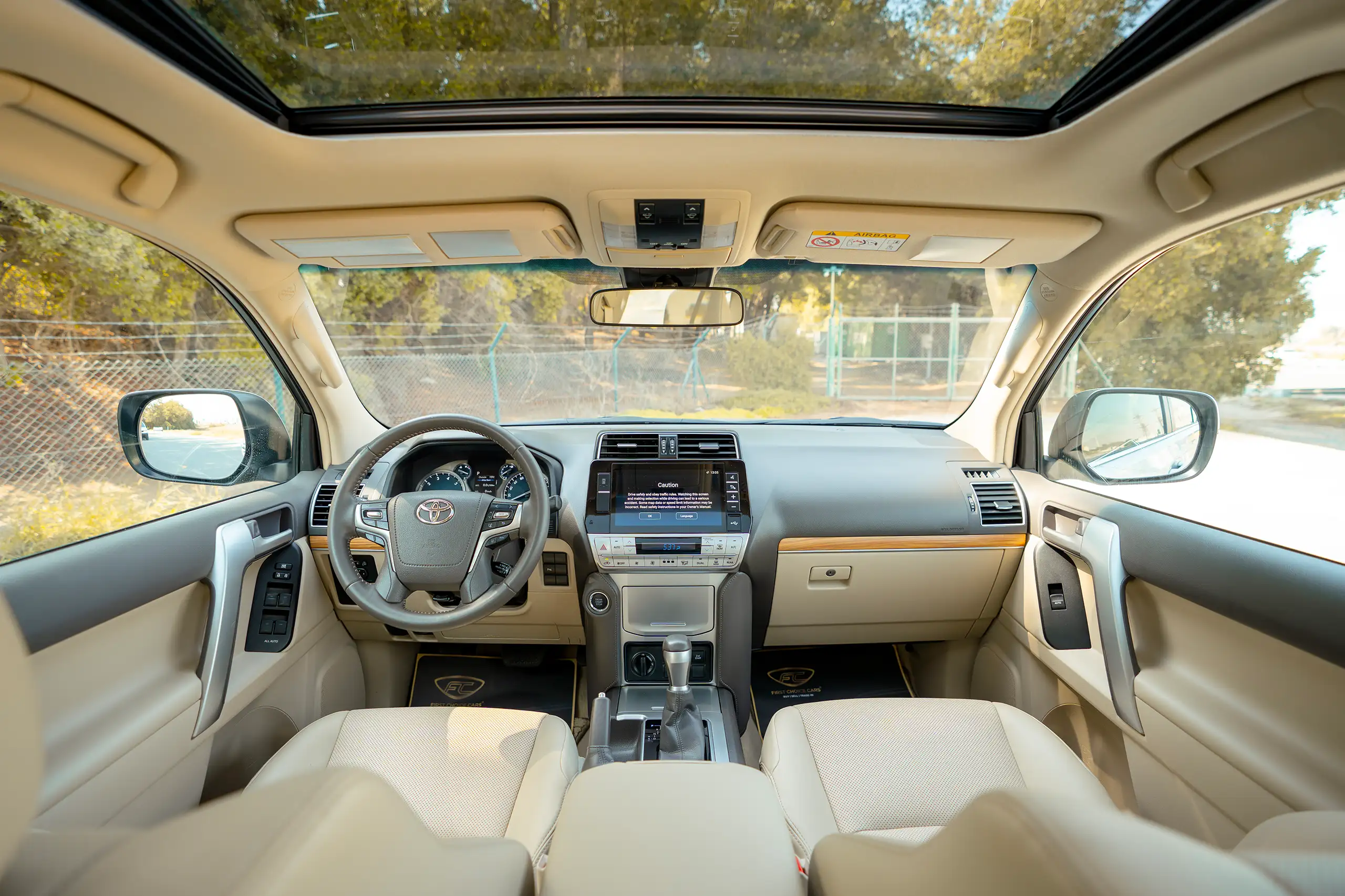 Used 2023 Toyota Prado VXR Silver – Front Cabin / Dashboard Full View at First Choice Cars Sharjah