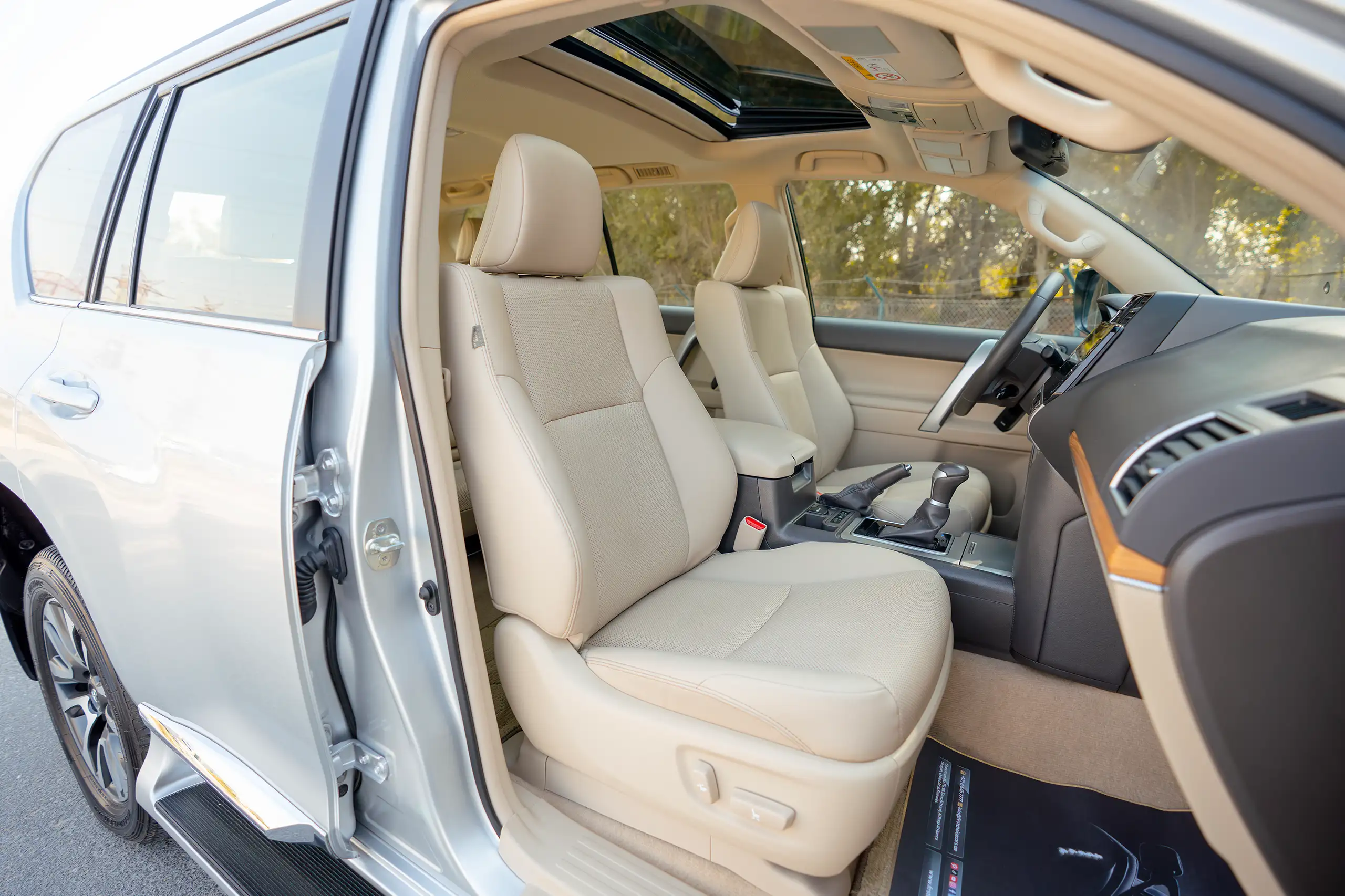 Used 2023 Toyota Prado VXR Silver – Front Passenger Side Cabin View at First Choice Cars Sharjah