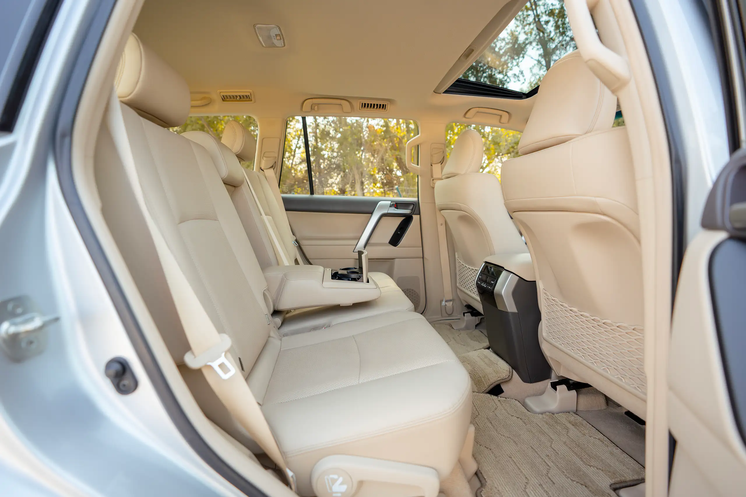 Used 2023 Toyota Prado VXR Silver – Rear Passenger Side Cabin View at First Choice Cars Sharjah