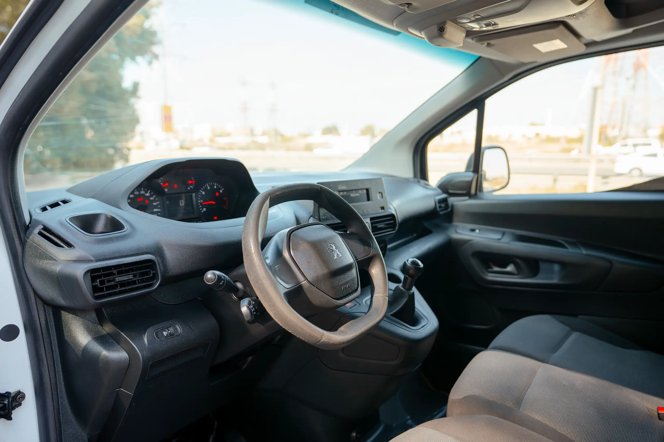 Used 2022 Peugeot Partner Standard White – Driver Side Dashboard & Steering View at First Choice Cars Sharjah