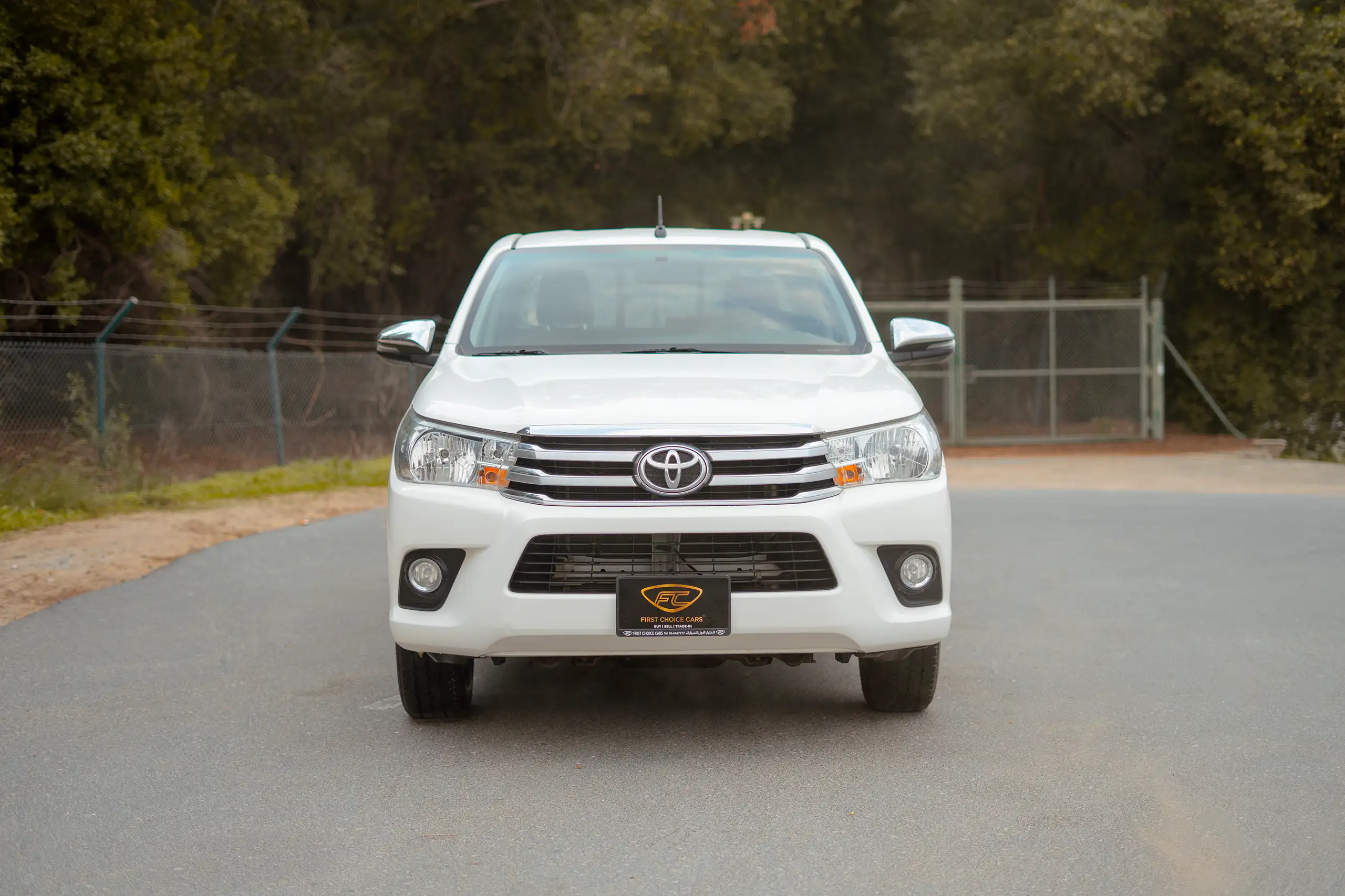 Used 2021 Toyota Hilux GLX Double Cabin White – Front View at First Choice Cars Sharjah