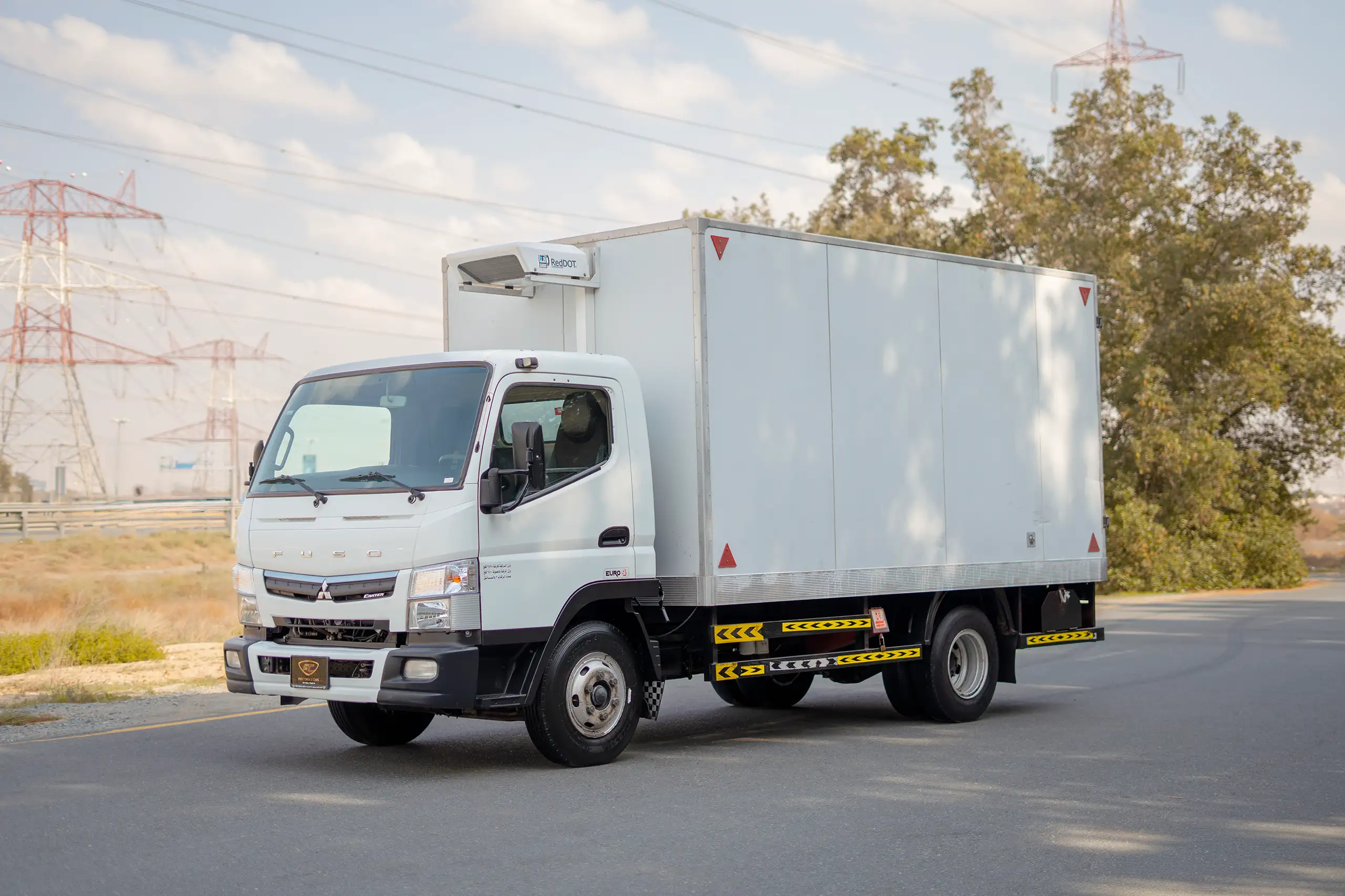 Used 2020 Mitsubishi Canter Chiller Box White – Left Front Diagonal (45°) View at First Choice Cars Sharjah