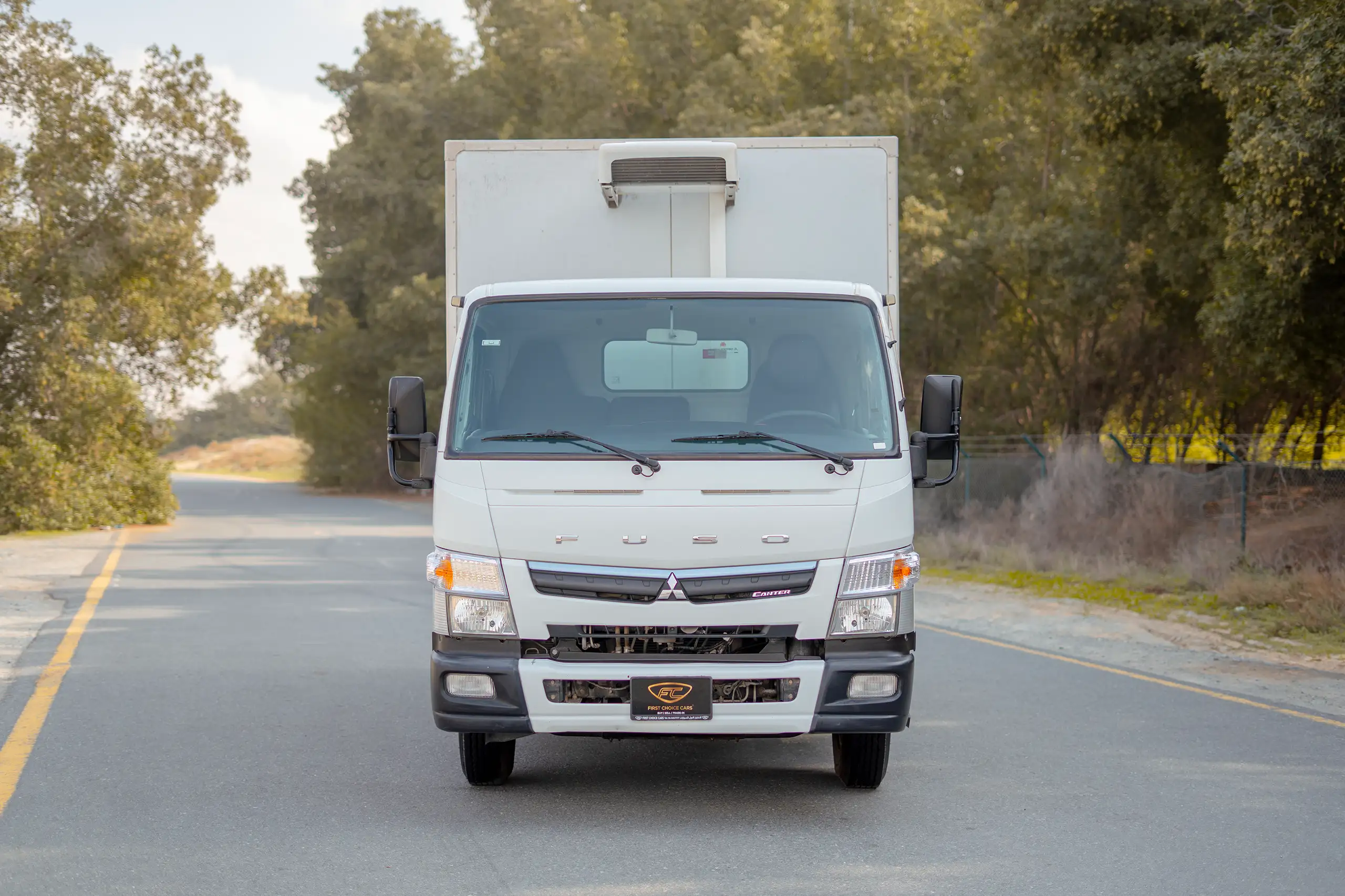 Used 2020 Mitsubishi Canter Chiller Box White – Front Seats View at First Choice Cars Sharjah