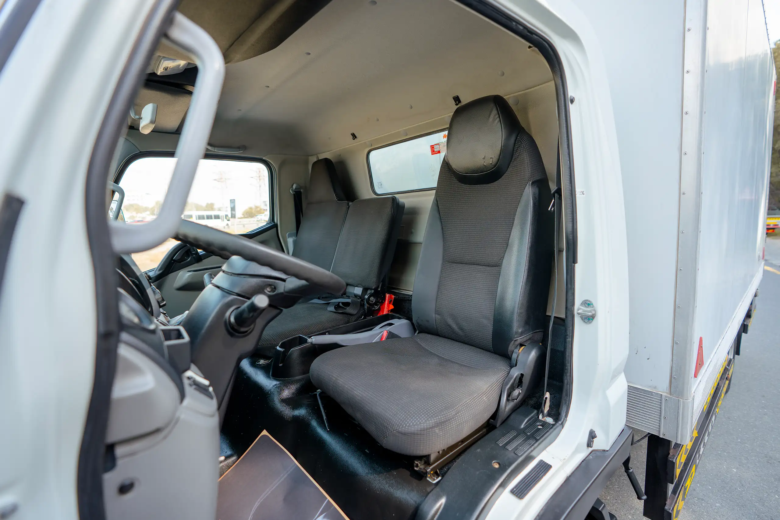 Used 2020 Mitsubishi Canter Chiller Box White – Front Driver Side Cabin View at First Choice Cars Sharjah