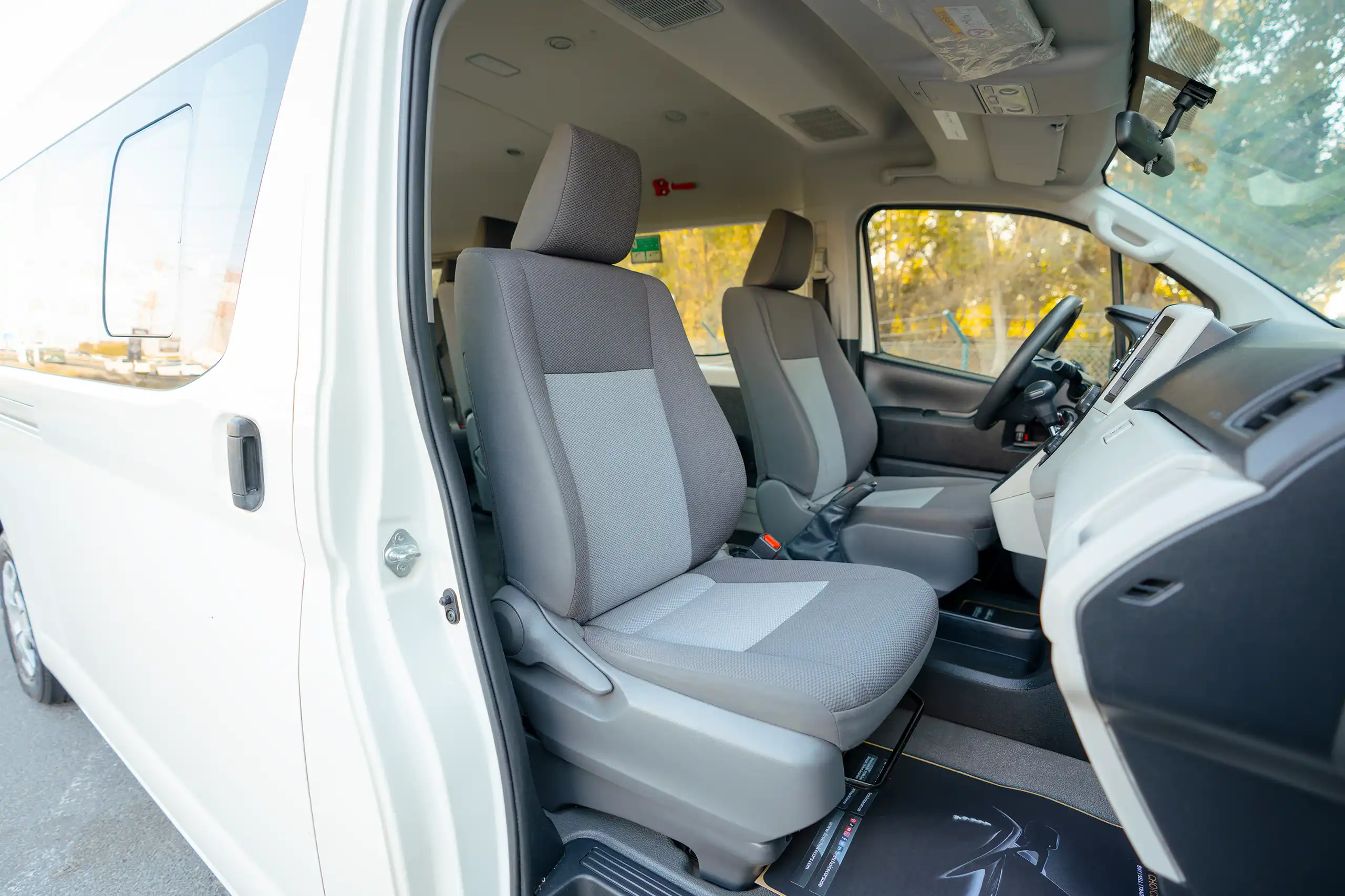 Used 2021 Toyota Hiace GL High Roof White – Front Passenger Side Cabin View at First Choice Cars Sharjah