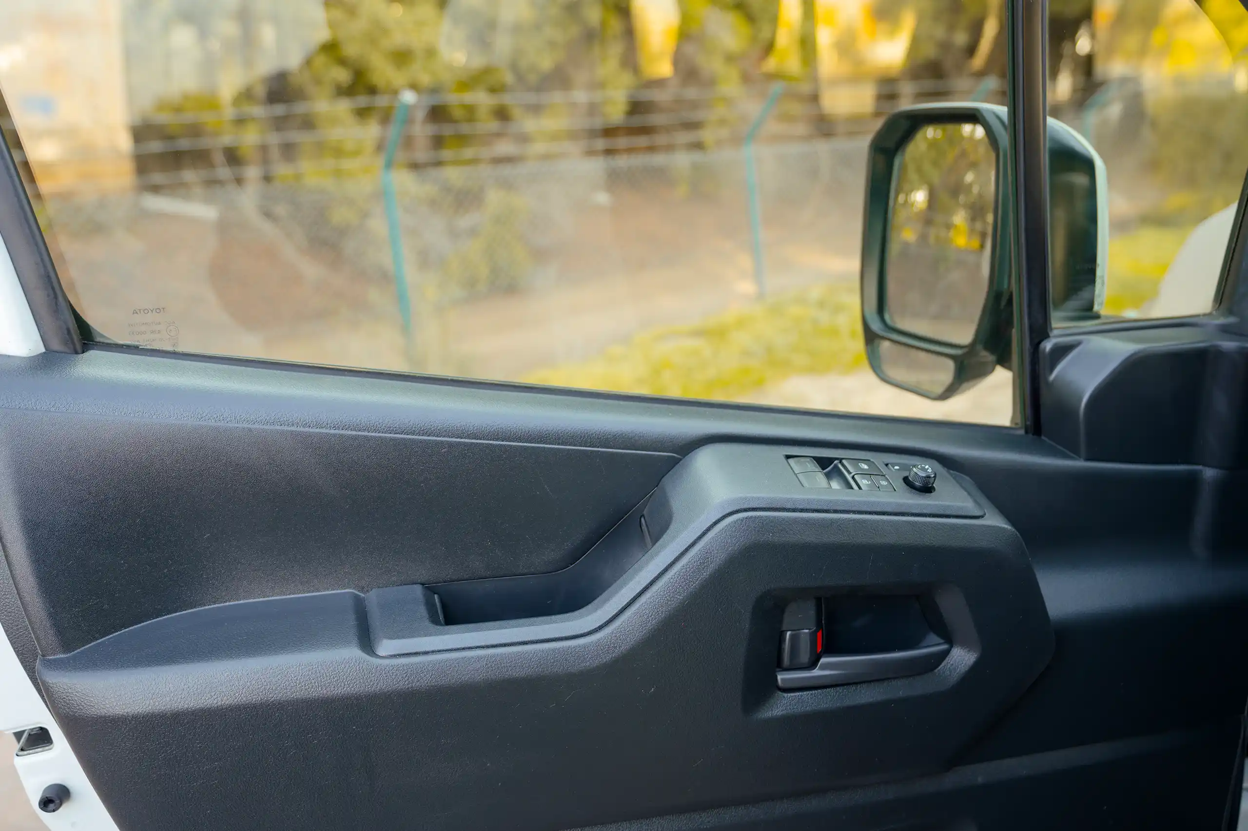 Used 2021 Toyota Hiace GL High Roof White – Driver Door Panel Full View at First Choice Cars Sharjah