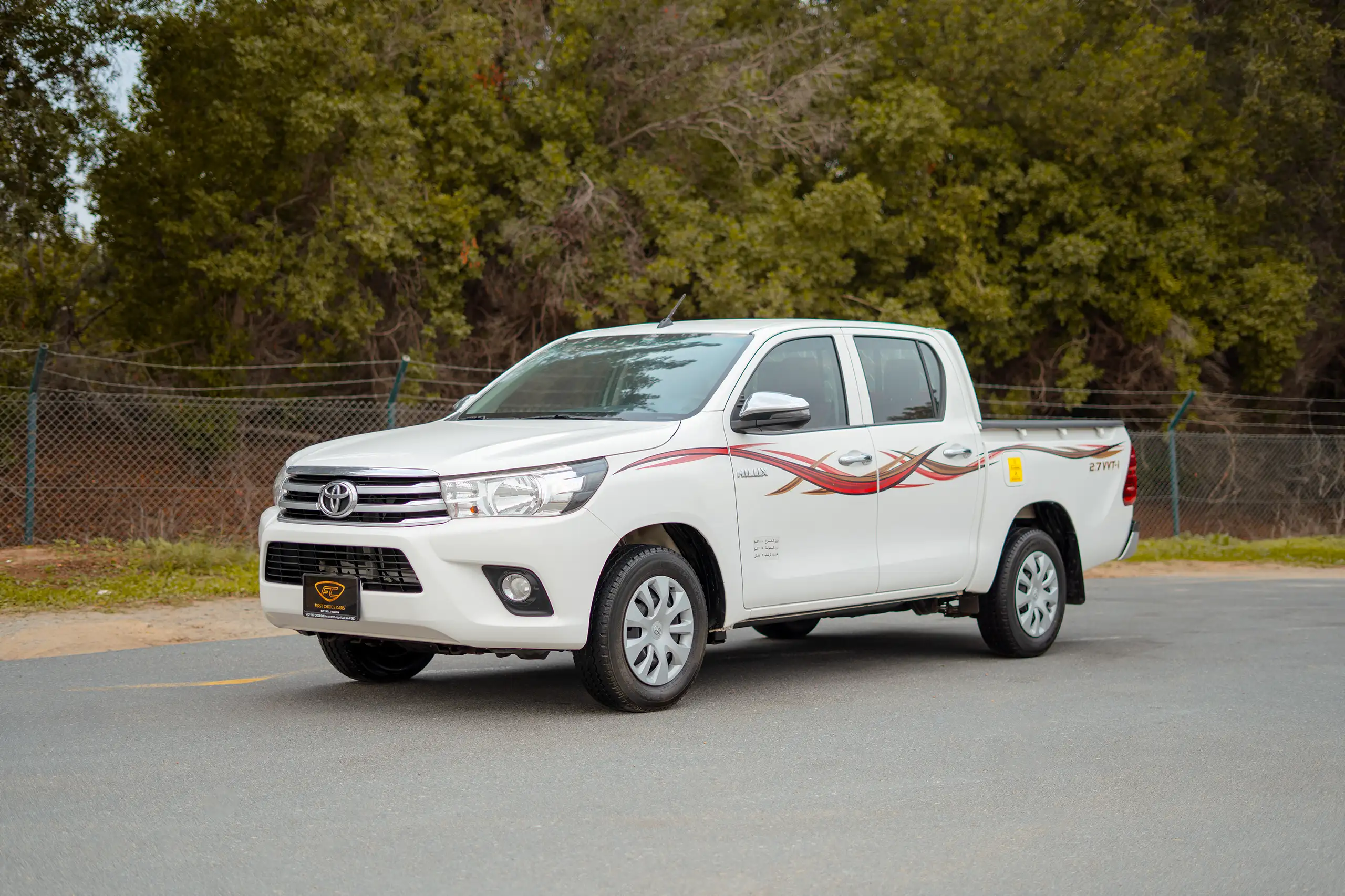 Used 2021 Toyota Hilux GLX Double Cabin White – Left Front Diagonal (45°) View at First Choice Cars Sharjah