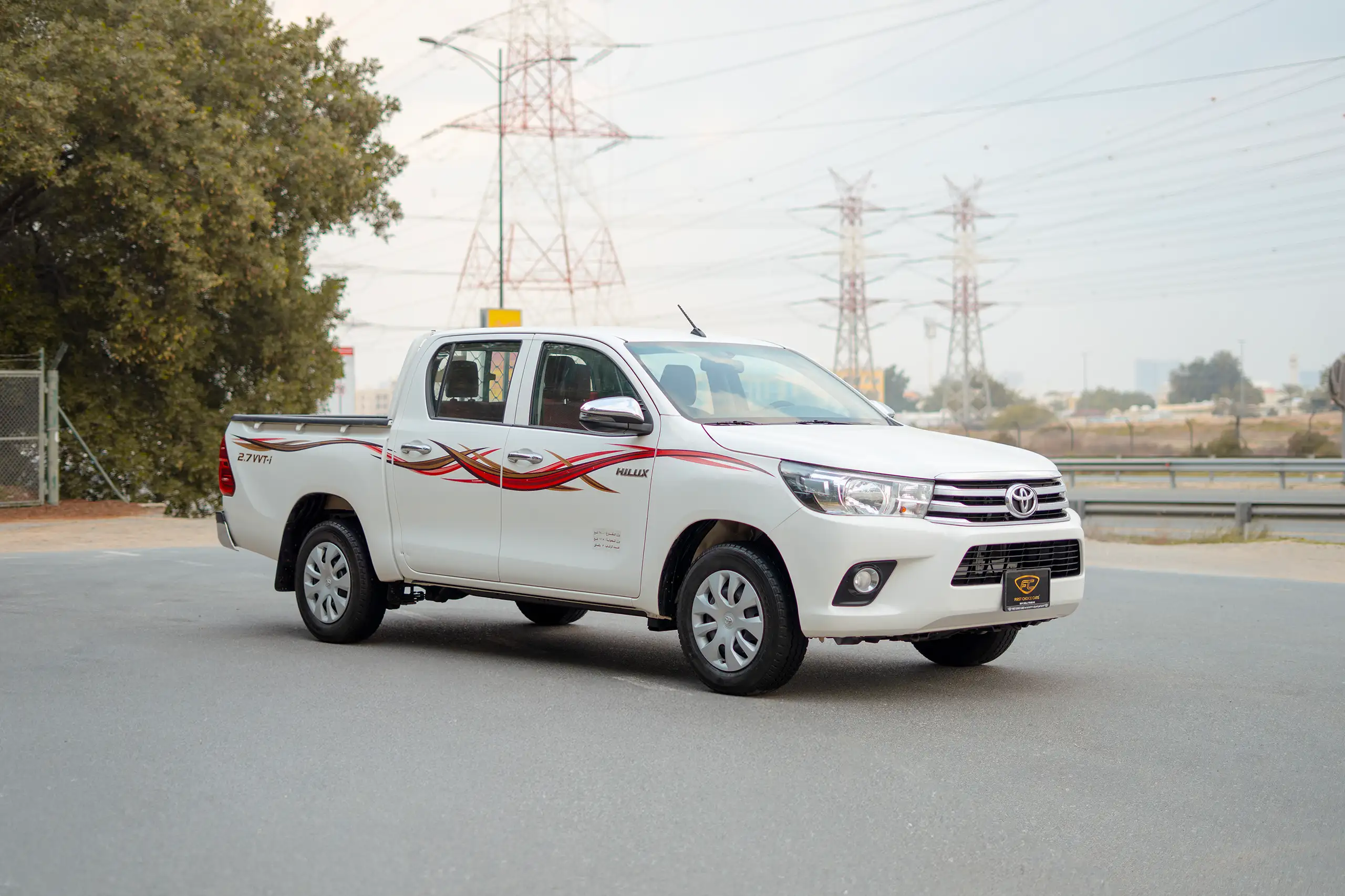 Used 2021 Toyota Hilux GLX Double Cabin White – Right Front Diagonal (45°) View at First Choice Cars Sharjah