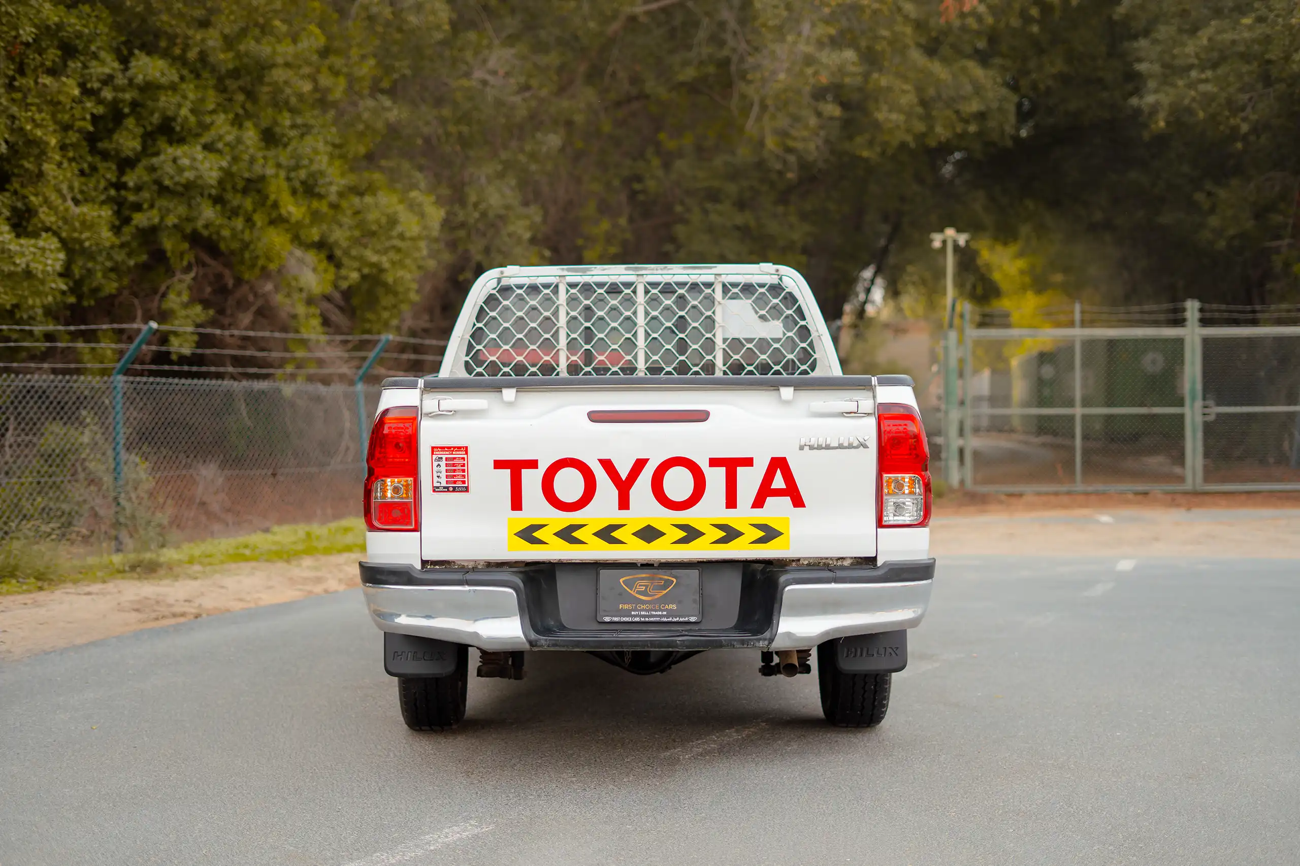 Used 2021 Toyota Hilux GLX Double Cabin White – Back/Rear View at First Choice Cars Sharjah