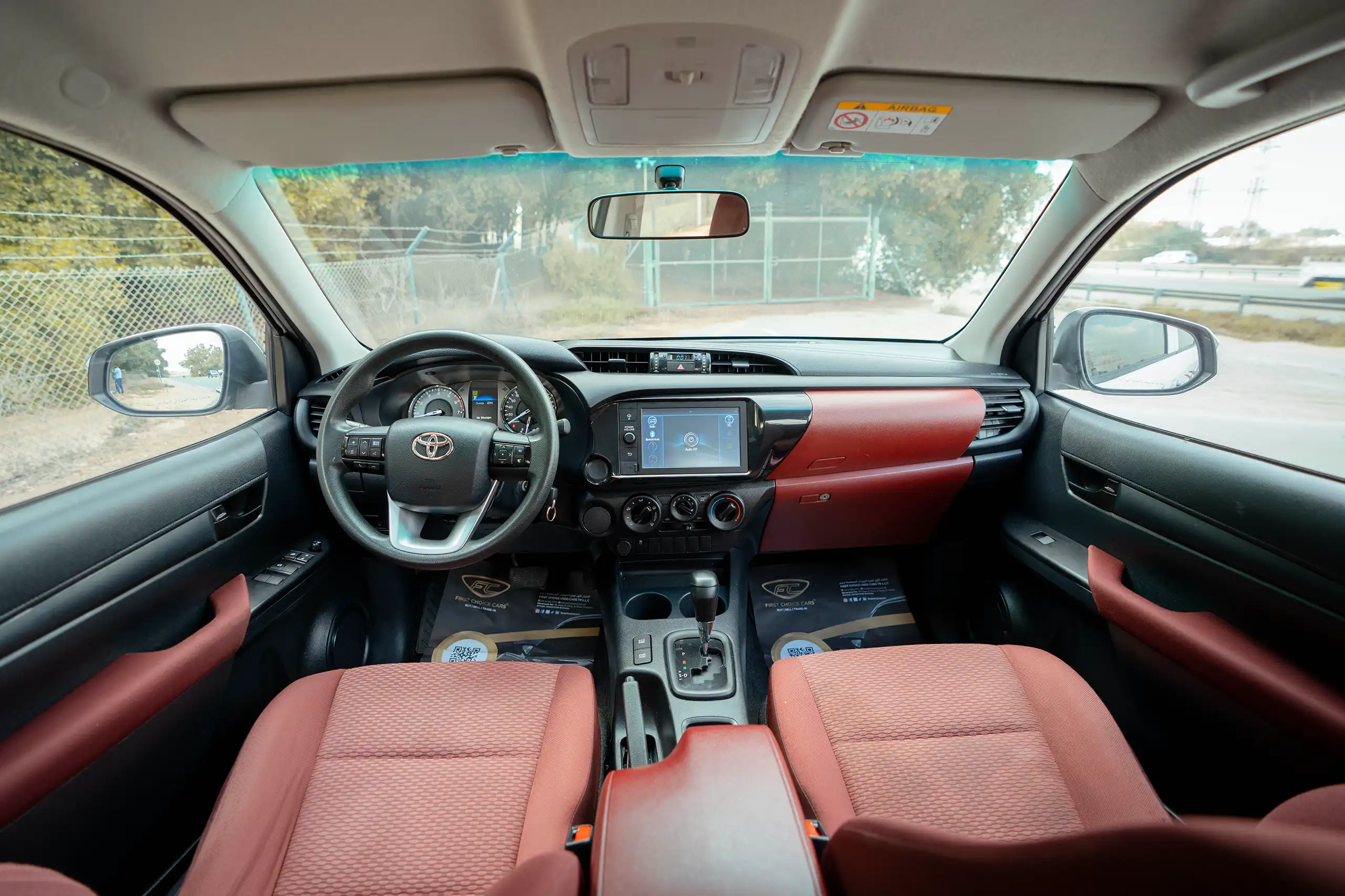 Used 2021 Toyota Hilux GLX Double Cabin White – Front Cabin / Dashboard Full View at First Choice Cars Sharjah