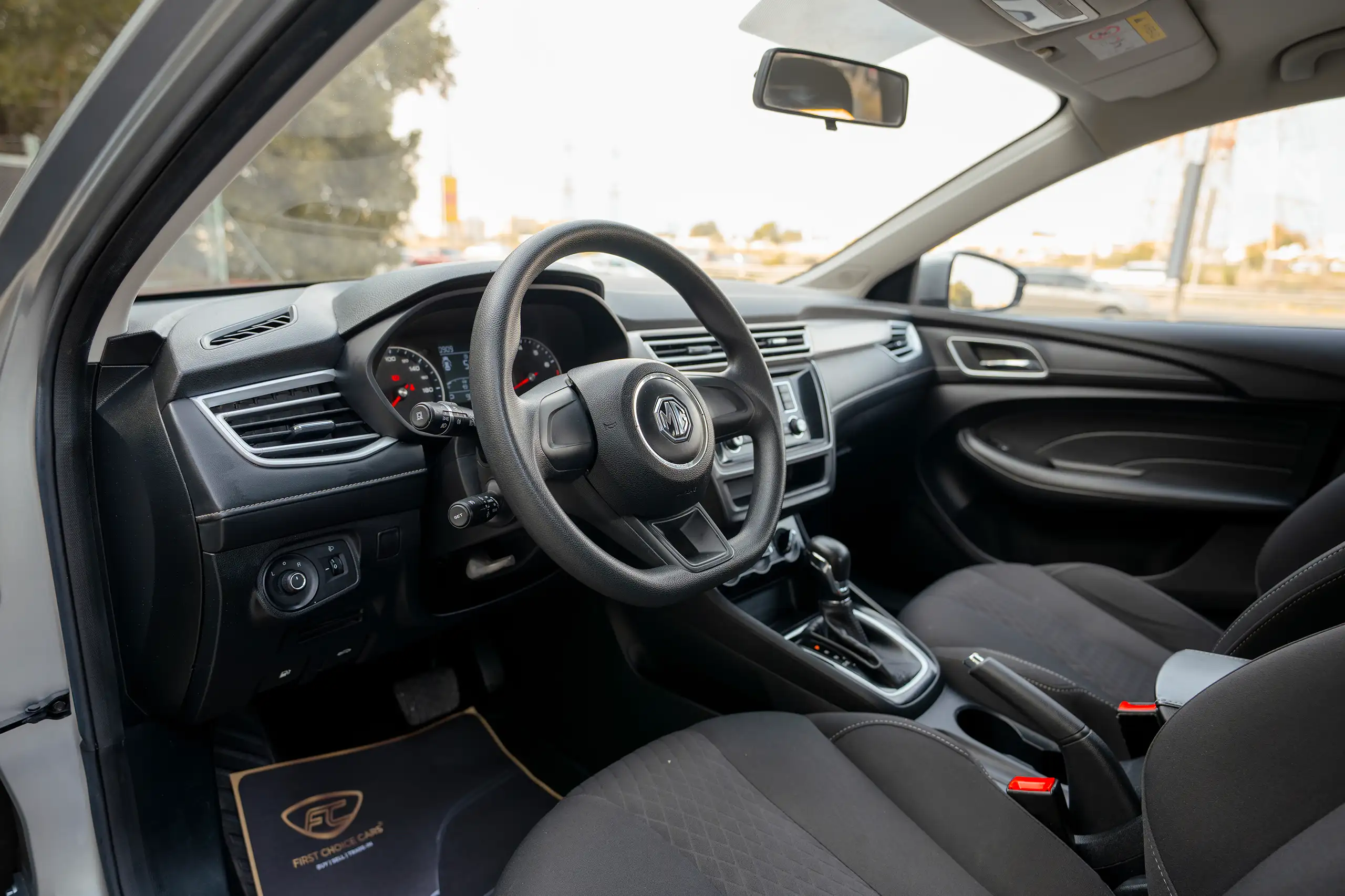 Used 2022 MG 5 Comfort Silver – Driver Side Dashboard & Steering View at First Choice Cars Sharjah