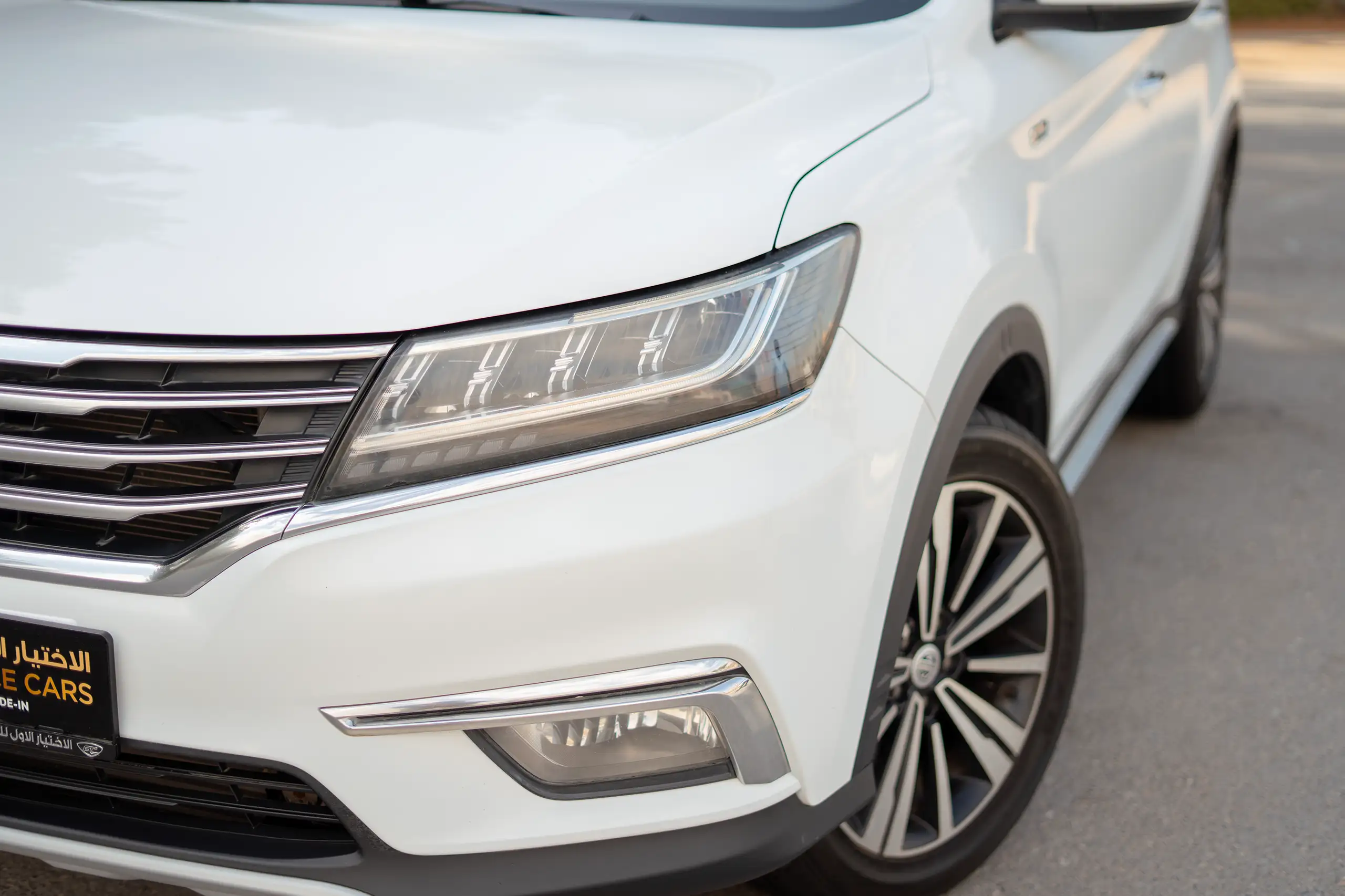 Used 2022 MG RX5 Luxury White – Headlight Close-up at First Choice Cars Sharjah