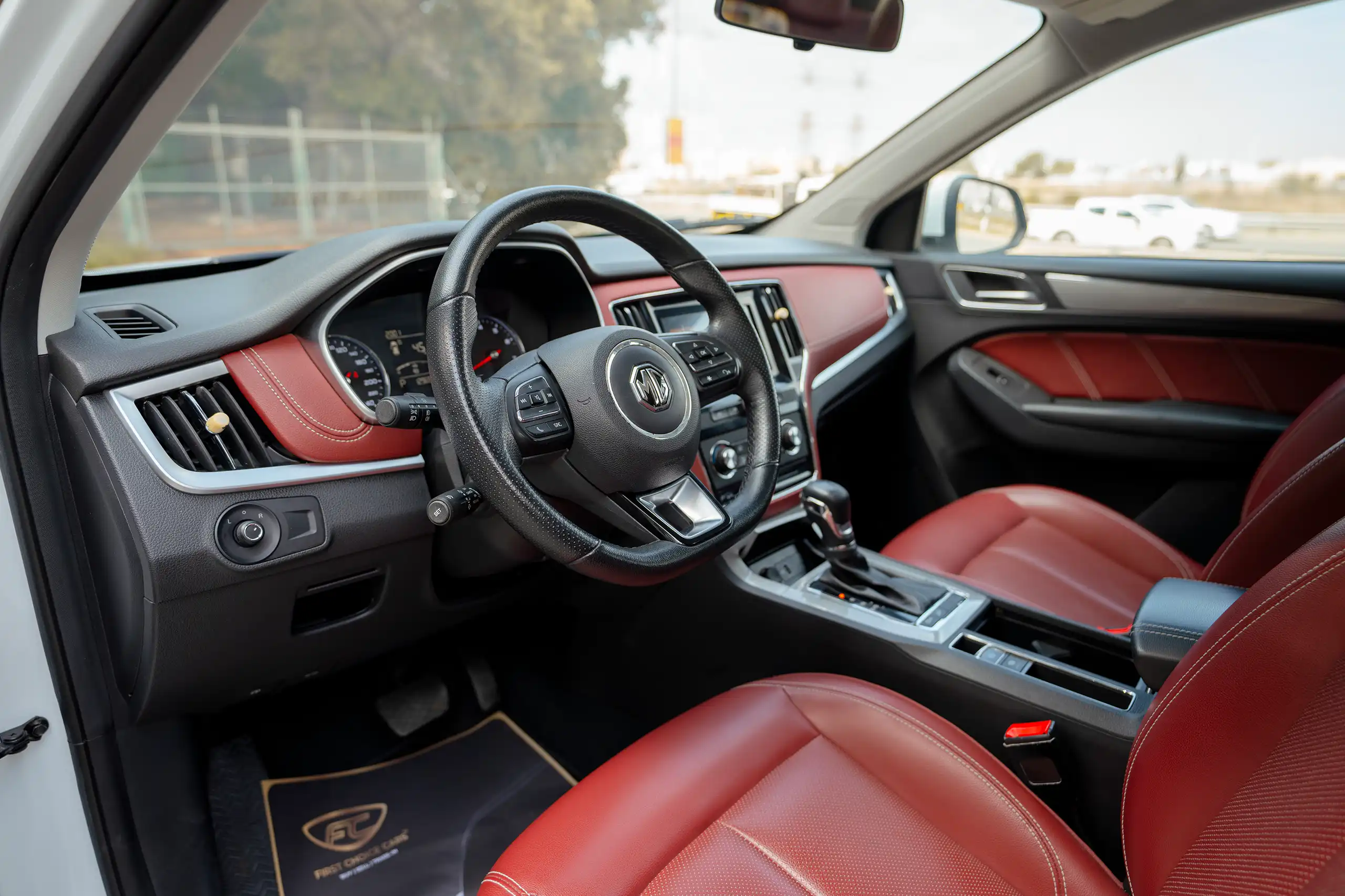 Used 2022 MG RX5 Luxury White – Driver Side Dashboard & Steering View at First Choice Cars Sharjah