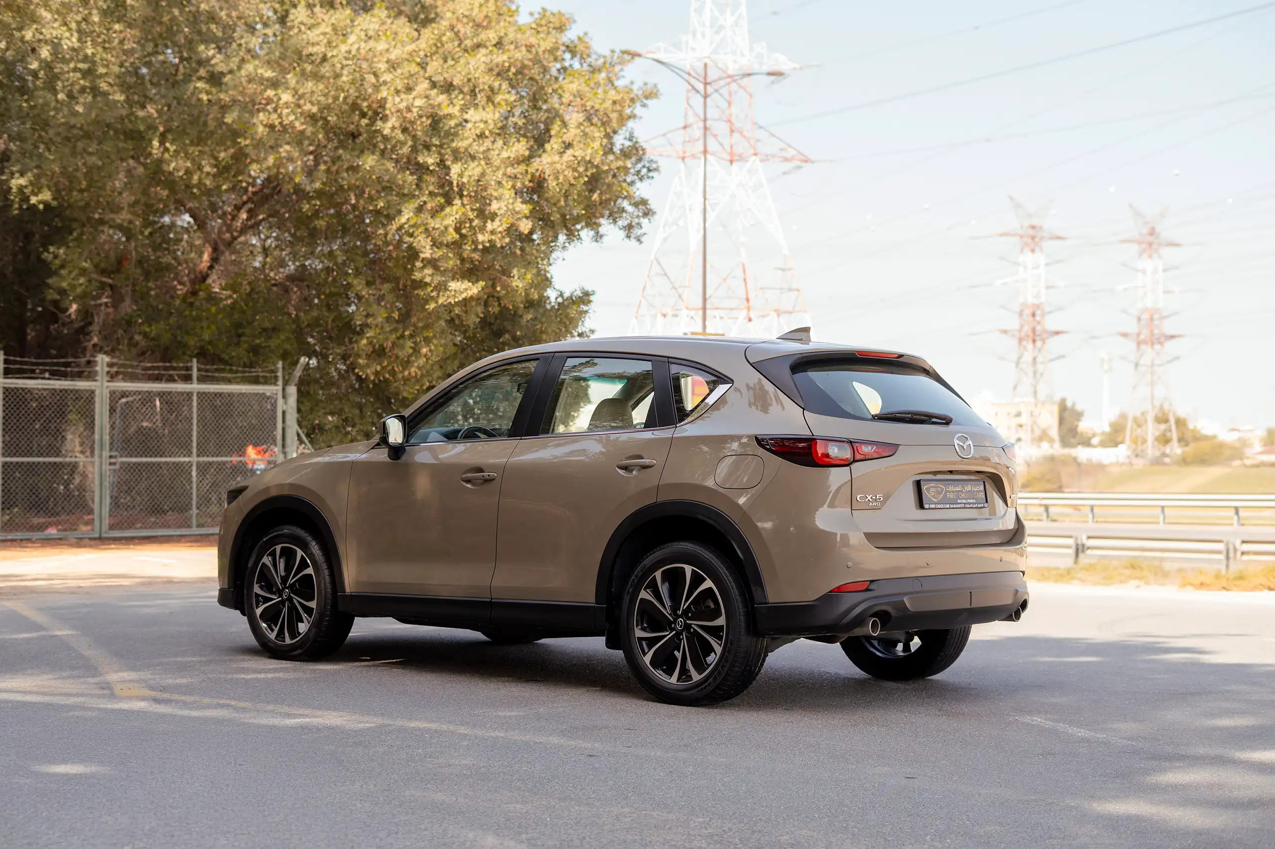 Used 2023 Mazda CX-5 GT Gold – Left Back Diagonal (45°) View at First Choice Cars Sharjah