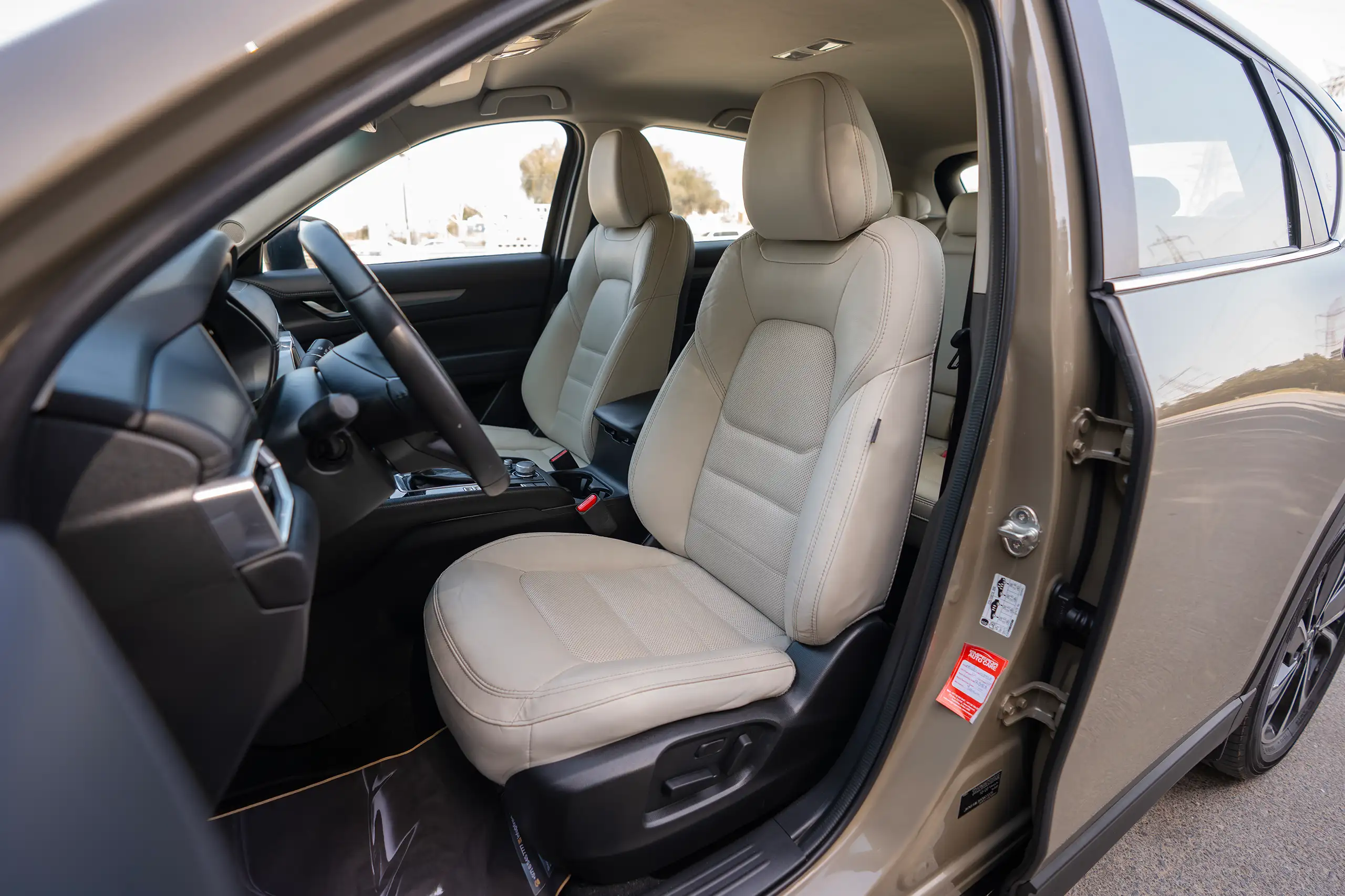 Used 2023 Mazda CX-5 GT Gold – Front Driver Side Cabin View at First Choice Cars Sharjah