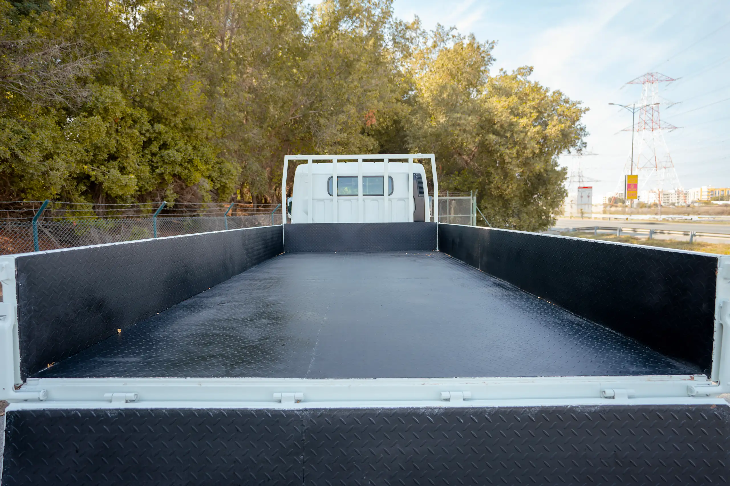 Used 2023 Mitsubishi Canter Cargo Body White – Boot / Trunk Space Open View at First Choice Cars Sharjah